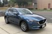 2019 Eternal Blue Mica /Black Mazda CX-5 Grand Touring (JM3KFBDM5K1) with an 4 Cyl 2.5 Liter engine, Automatic 6 Speed transmission, located at 2304 W. Main St., Boise, ID, 83702, (208) 342-7777, 43.622105, -116.218658 - GT Premium Package! All Wheel Drive! Apple Car Play/Android Auto! Clean Car! - Photo#2