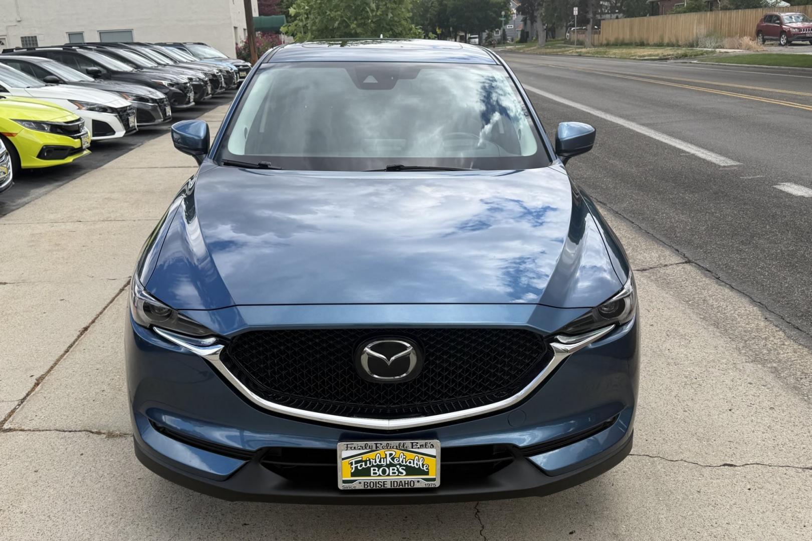2019 Eternal Blue Mica /Black Mazda CX-5 Grand Touring (JM3KFBDM5K1) with an 4 Cyl 2.5 Liter engine, Automatic 6 Speed transmission, located at 2304 W. Main St., Boise, ID, 83702, (208) 342-7777, 43.622105, -116.218658 - GT Premium Package! All Wheel Drive! Apple Car Play/Android Auto! Clean Car! - Photo#3