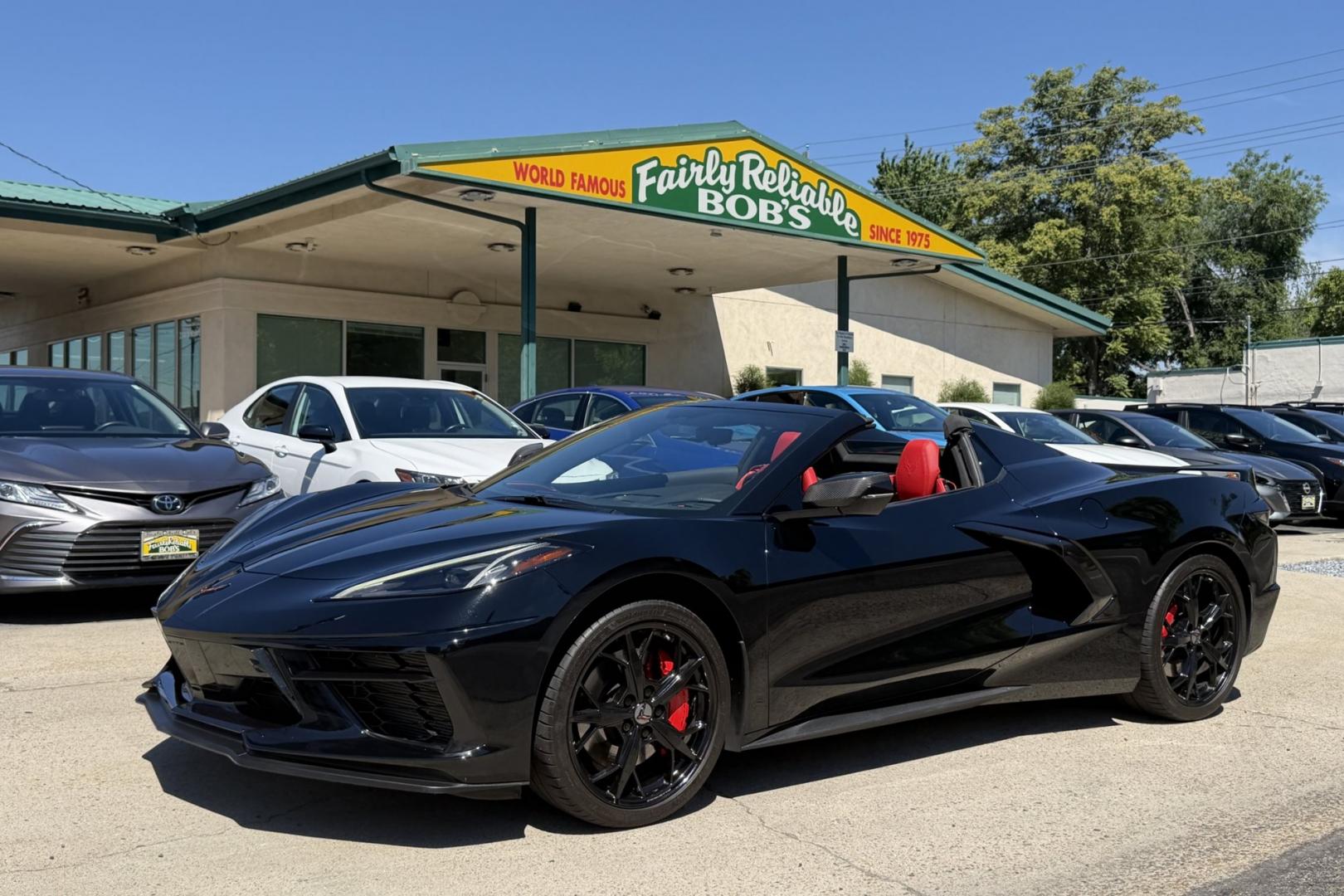 2021 Black /Adrenaline Red Chevrolet Corvette Stingray Convertible 3LT Z51 (1G1YC3D44M5) with an V8 6.2 Liter engine, Automatic 8 Speed transmission, located at 2304 W. Main St., Boise, ID, 83702, (208) 342-7777, 43.622105, -116.218658 - Highly Optioned And Beautiful!- Photo#0
