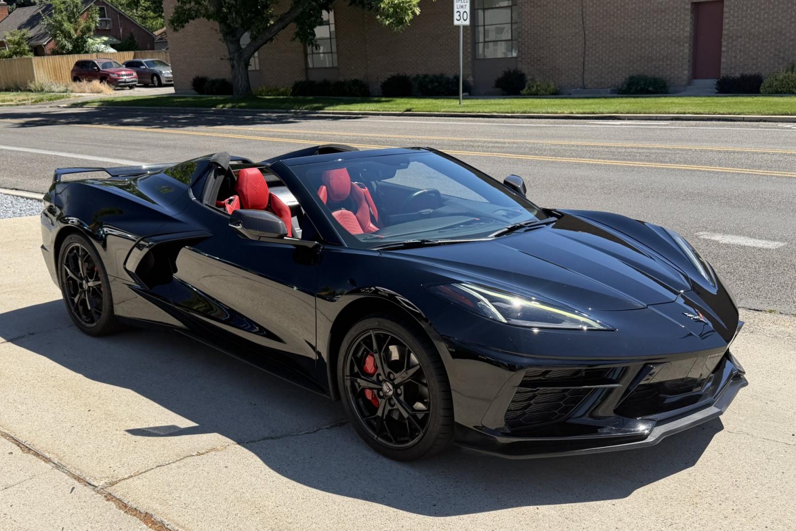 2021 Black /Adrenaline Red Chevrolet Corvette Stingray Convertible 3LT Z51 (1G1YC3D44M5) with an V8 6.2 Liter engine, Automatic 8 Speed transmission, located at 2304 W. Main St., Boise, ID, 83702, (208) 342-7777, 43.622105, -116.218658 - Highly Optioned And Beautiful!- Photo#2