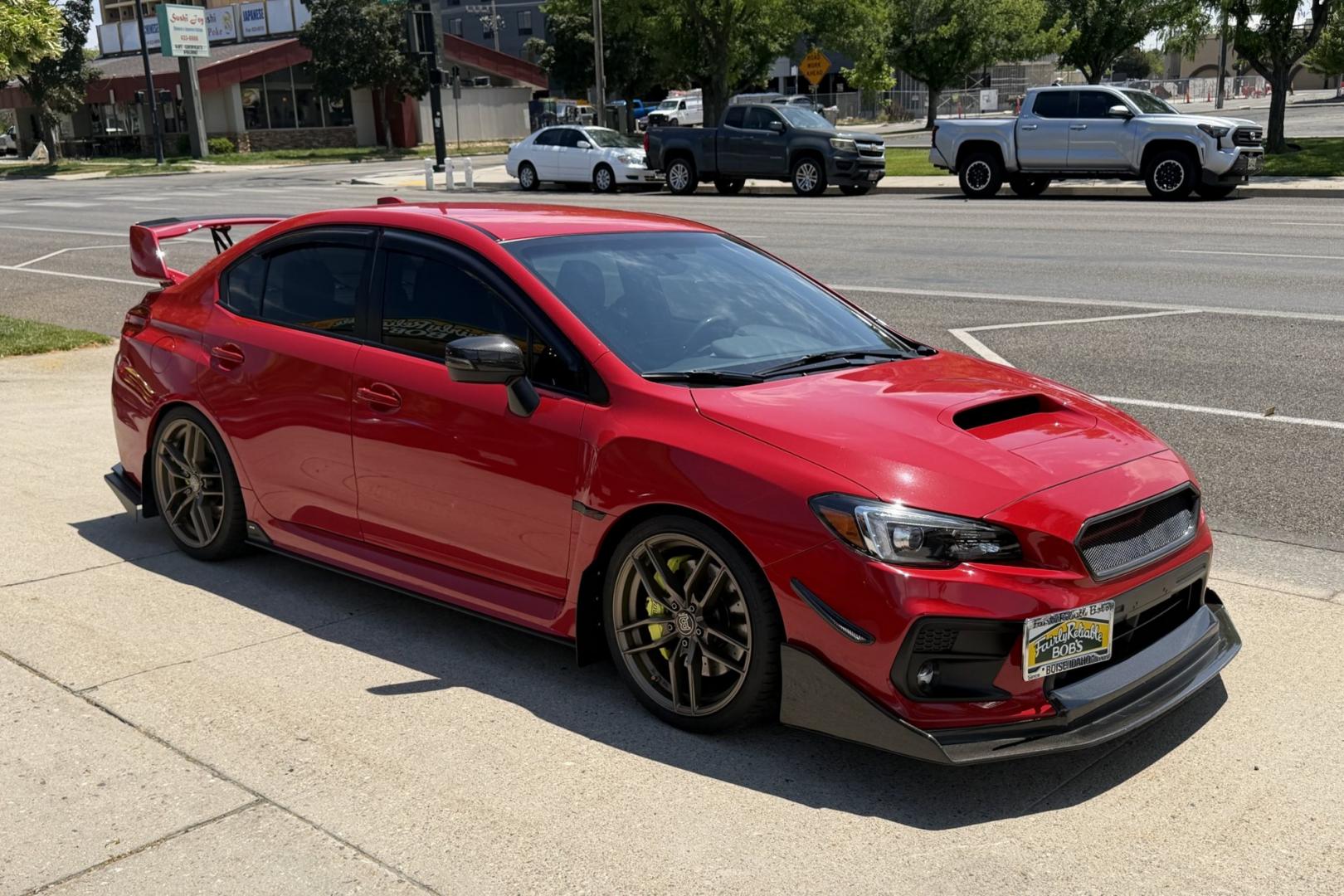 2018 Pure Red /Black/Red Subaru WRX STi (JF1VA2N67J9) with an H4 2.5 Liter Turbo engine, 6 Speed transmission, located at 2304 W. Main St., Boise, ID, 83702, (208) 342-7777, 43.622105, -116.218658 - Stunning WRX STi !- Photo#2