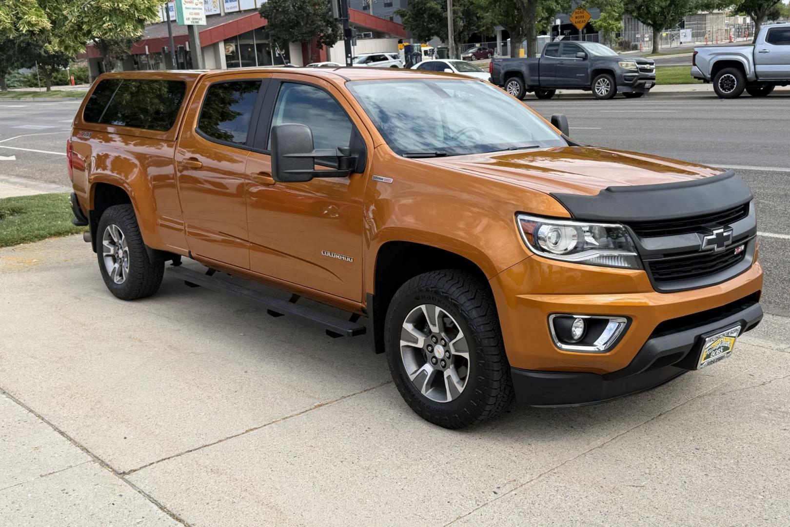 2017 Burning Hot Metallic /Black Chevrolet Colorado Z71 (1GCPTDE14H1) with an 4 Cyl 2.8 Liter Duramax Turbo Diesel engine, Automatic 6 Speed transmission, located at 2304 W. Main St., Boise, ID, 83702, (208) 342-7777, 43.622105, -116.218658 - Matching Leer Shell! Very Clean Colorado Diesel!- Photo#4