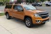 2017 Burning Hot Metallic /Black Chevrolet Colorado Z71 (1GCPTDE14H1) with an 4 Cyl 2.8 Liter Duramax Turbo Diesel engine, Automatic 6 Speed transmission, located at 2304 W. Main St., Boise, ID, 83702, (208) 342-7777, 43.622105, -116.218658 - Matching Leer Shell! Very Clean Colorado Diesel!- Photo#4