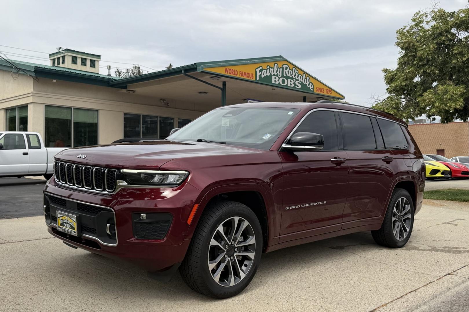 2023 Velvet Red Pearl /Gray Jeep Grand Cherokee L Overland (1C4RJKDGXP8) with an V6 3.6 Liter engine, Automatic 8 Speed transmission, located at 2304 W. Main St., Boise, ID, 83702, (208) 342-7777, 43.622105, -116.218658 - New Tires! Highly Optioned With Comfort, Safety And Power!- Photo#0