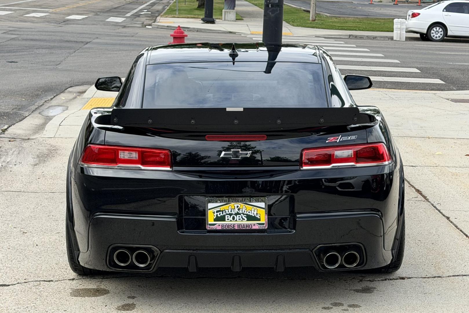 2014 Black /Black Chevrolet Camaro Z/28 (2G1FS1EE3E9) with an V8 7.0 Liter LS7 engine, 6 Speed Manual transmission, located at 2304 W. Main St., Boise, ID, 83702, (208) 342-7777, 43.622105, -116.218658 - The 2014 Chevrolet Camaro Z/28 is a track-focused, bare-bones supercar-killer. Powered by a 505-hp 7.0-liter LS7 V8. Raw, analog performance, Multimatic DSSV dampers, massive carbon-ceramic brakes, and extreme grip. This is a drivers car!- Photo#1