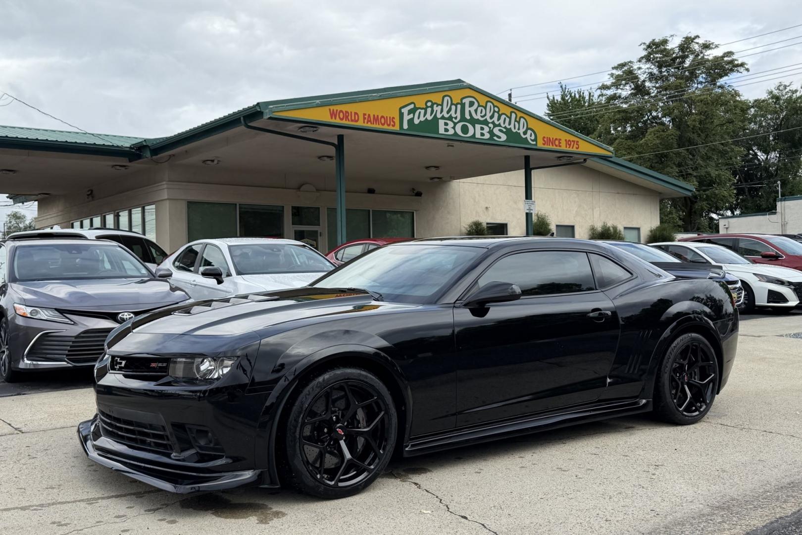 2014 Black /Black Chevrolet Camaro Z/28 (2G1FS1EE3E9) with an V8 7.0 Liter LS7 engine, 6 Speed Manual transmission, located at 2304 W. Main St., Boise, ID, 83702, (208) 342-7777, 43.622105, -116.218658 - The 2014 Chevrolet Camaro Z/28 is a track-focused, bare-bones supercar-killer. Powered by a 505-hp 7.0-liter LS7 V8. Raw, analog performance, Multimatic DSSV dampers, massive carbon-ceramic brakes, and extreme grip. This is a drivers car!- Photo#0