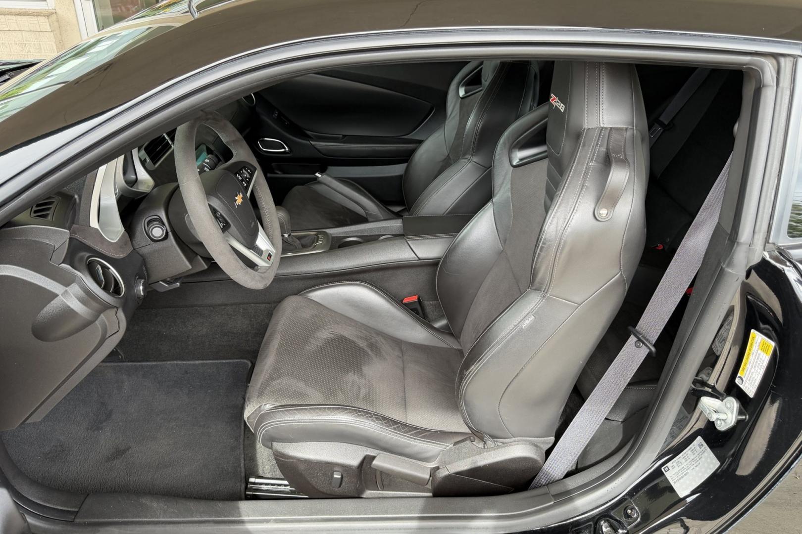 2014 Black /Black Chevrolet Camaro Z/28 (2G1FS1EE3E9) with an V8 7.0 Liter LS7 engine, 6 Speed Manual transmission, located at 2304 W. Main St., Boise, ID, 83702, (208) 342-7777, 43.622105, -116.218658 - The 2014 Chevrolet Camaro Z/28 is a track-focused, bare-bones supercar-killer. Powered by a 505-hp 7.0-liter LS7 V8. Raw, analog performance, Multimatic DSSV dampers, massive carbon-ceramic brakes, and extreme grip. This is a drivers car!- Photo#7