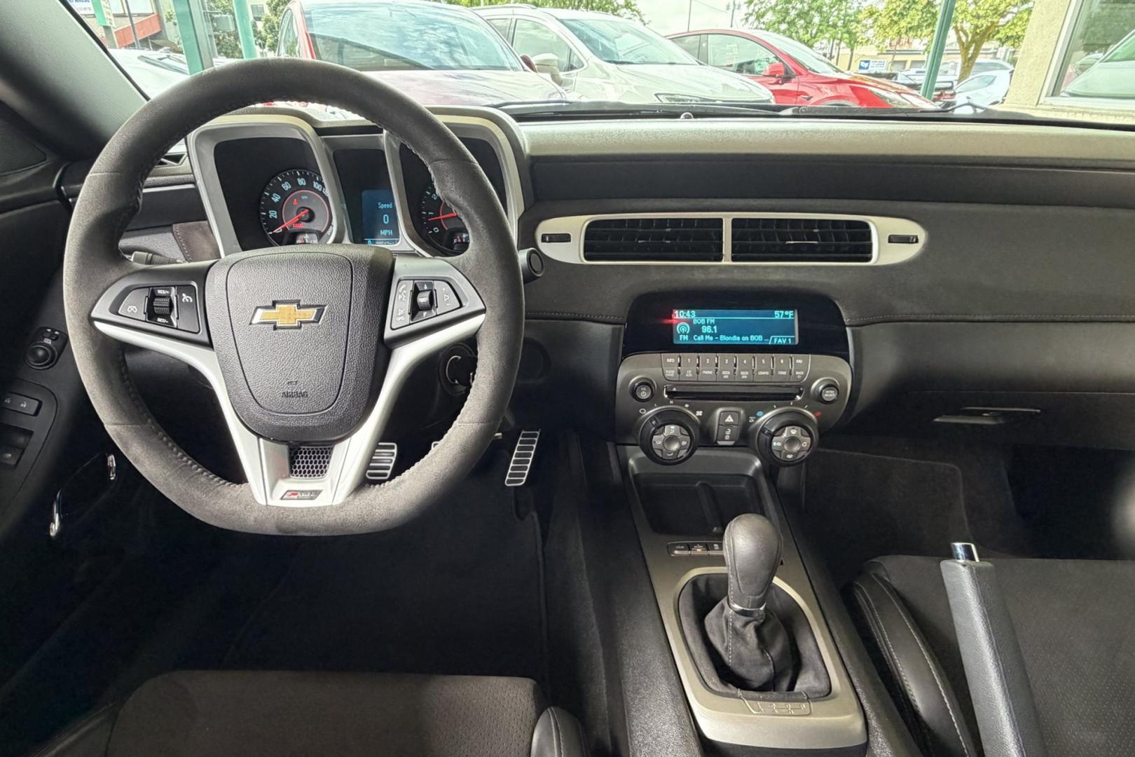 2014 Black /Black Chevrolet Camaro Z/28 (2G1FS1EE3E9) with an V8 7.0 Liter LS7 engine, 6 Speed Manual transmission, located at 2304 W. Main St., Boise, ID, 83702, (208) 342-7777, 43.622105, -116.218658 - The 2014 Chevrolet Camaro Z/28 is a track-focused, bare-bones supercar-killer. Powered by a 505-hp 7.0-liter LS7 V8. Raw, analog performance, Multimatic DSSV dampers, massive carbon-ceramic brakes, and extreme grip. This is a drivers car!- Photo#12