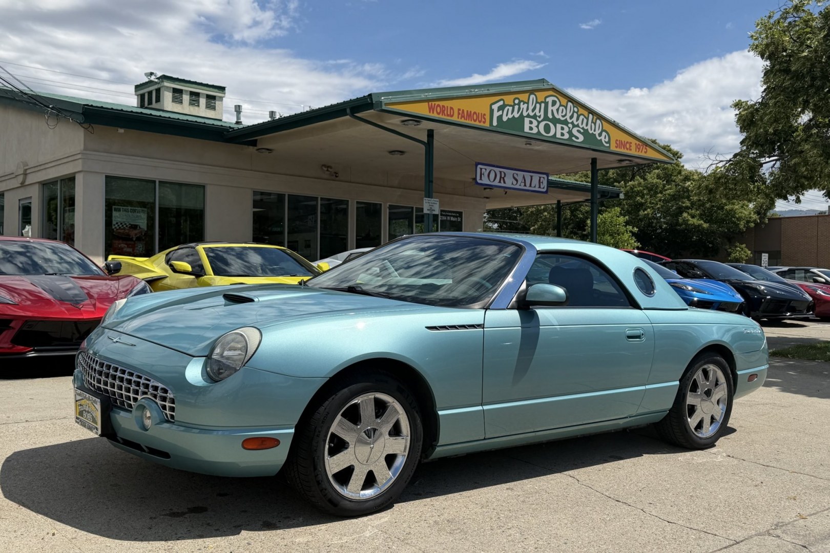 2002 Thunderbird Blue /Thunderbird Blue Ford Thunderbird Deluxe (1FAHP60A22Y) with an V8 3.9 Liter engine, Automatic transmission, located at 2304 W. Main St., Boise, ID, 83702, (208) 342-7777, 43.622105, -116.218658 - Stunning And Rare Color Combination! Hardtop And Power Convertible Soft Top!- Photo#0