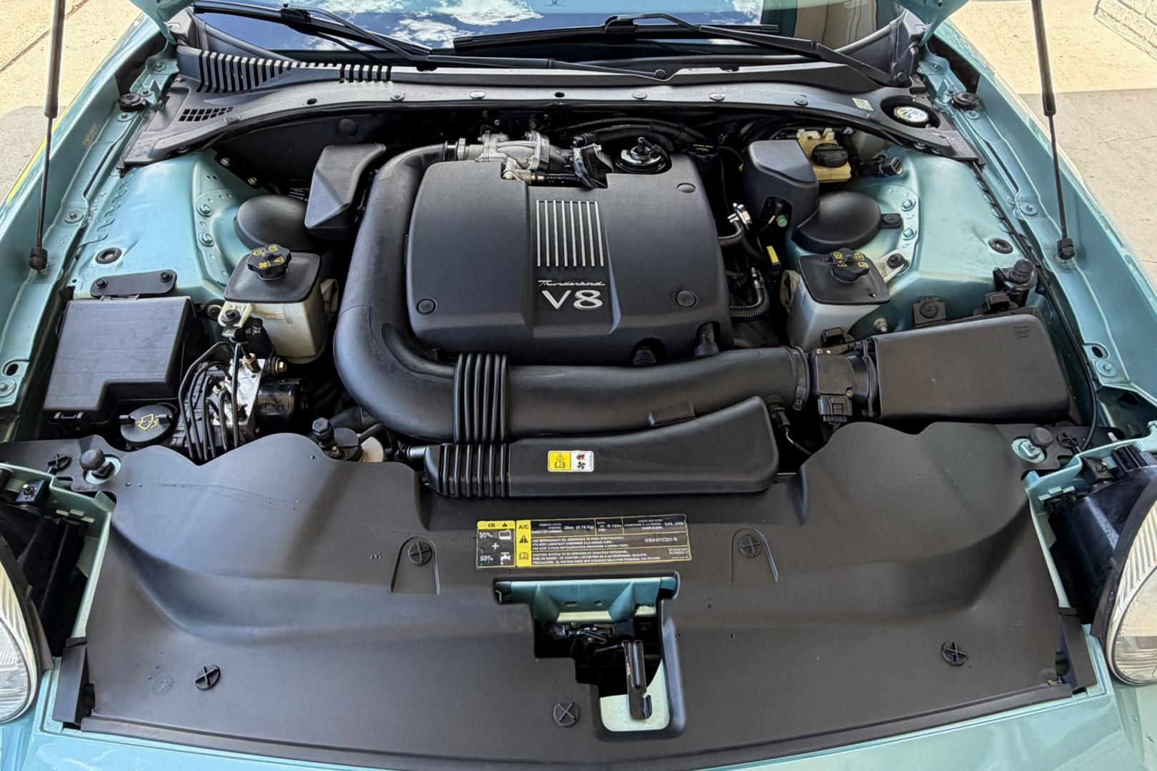 2002 Thunderbird Blue /Thunderbird Blue Ford Thunderbird Deluxe (1FAHP60A22Y) with an V8 3.9 Liter engine, Automatic transmission, located at 2304 W. Main St., Boise, ID, 83702, (208) 342-7777, 43.622105, -116.218658 - Stunning And Rare Color Combination! Hardtop And Power Convertible Soft Top!- Photo#11