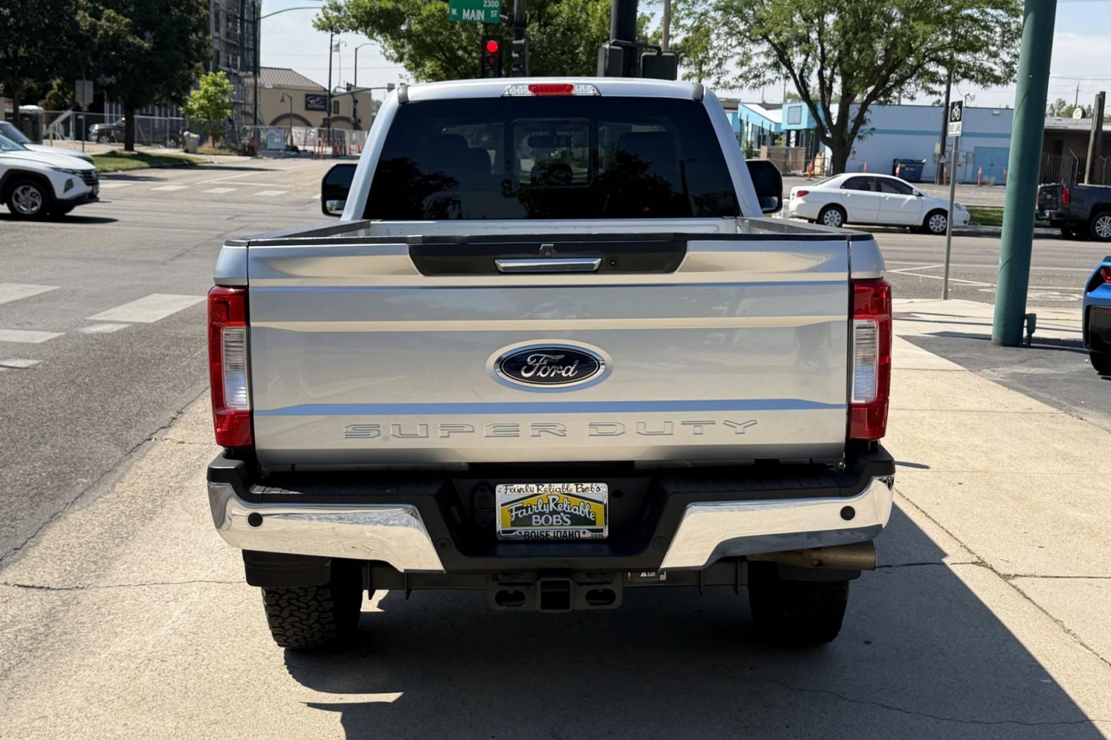 2019 Silver /Black Ford F-350 Lariat (1FT8W3BT7KE) with an V8 6.7 Liter Powerstroke Turbo Diesel engine, Automatic 6 Speed transmission, located at 2304 W. Main St., Boise, ID, 83702, (208) 342-7777, 43.622105, -116.218658 - Front Bench Split Seating For 6! Long Bed! Ready To Haul!- Photo#1