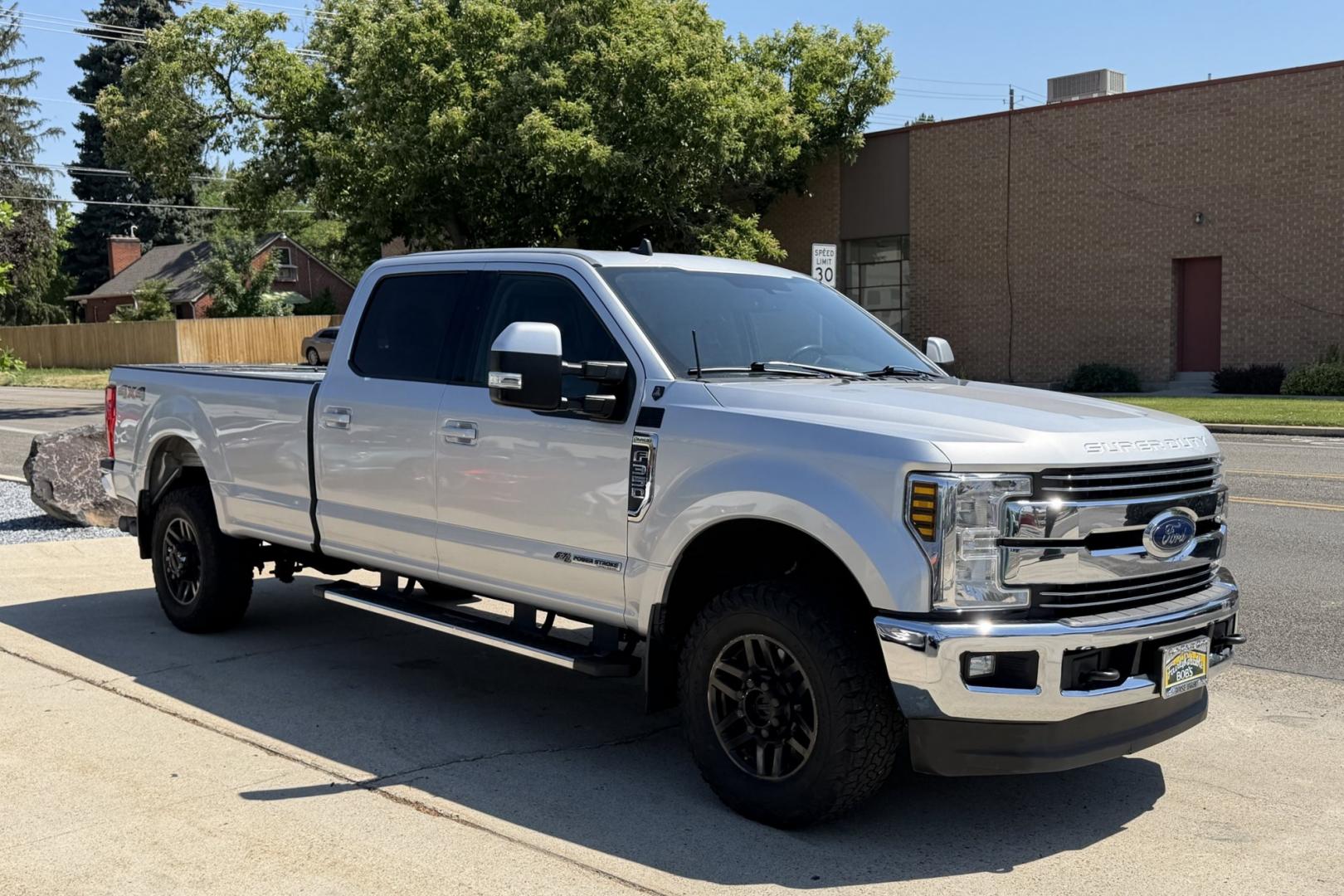 2019 Silver /Black Ford F-350 Lariat (1FT8W3BT7KE) with an V8 6.7 Liter Powerstroke Turbo Diesel engine, Automatic 6 Speed transmission, located at 2304 W. Main St., Boise, ID, 83702, (208) 342-7777, 43.622105, -116.218658 - Front Bench Split Seating For 6! Long Bed! Ready To Haul!- Photo#4