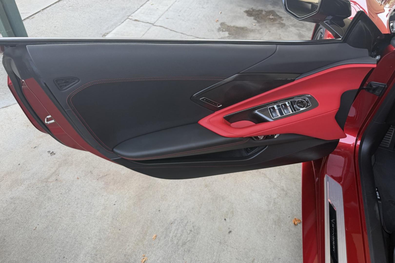 2023 Red Mist Metallic /Jet Black/Adrenaline Red Chevrolet Corvette Stingray 2LT (1G1YB3D46P5) with an V8 6.2 Liter engine, Automatic 8 Speed transmission, located at 2304 W. Main St., Boise, ID, 83702, (208) 342-7777, 43.622105, -116.218658 - Red Mist Metallic! 2LT w/ Lift! Very Clean!- Photo#4