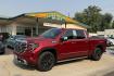 2023 Volcanic Red Tintcoat /Atmosphere/Brownstone GMC Sierra 1500 Denali (3GTUUGE81PG) with an 6 Cyl 3.0 Liter Duramax Turbo Diesel engine, Automatic 10 Speed transmission, located at 2304 W. Main St., Boise, ID, 83702, (208) 342-7777, 43.622105, -116.218658 - Clean, Low Mileage And Stunning! Power Running Boards Too!- Photo#0