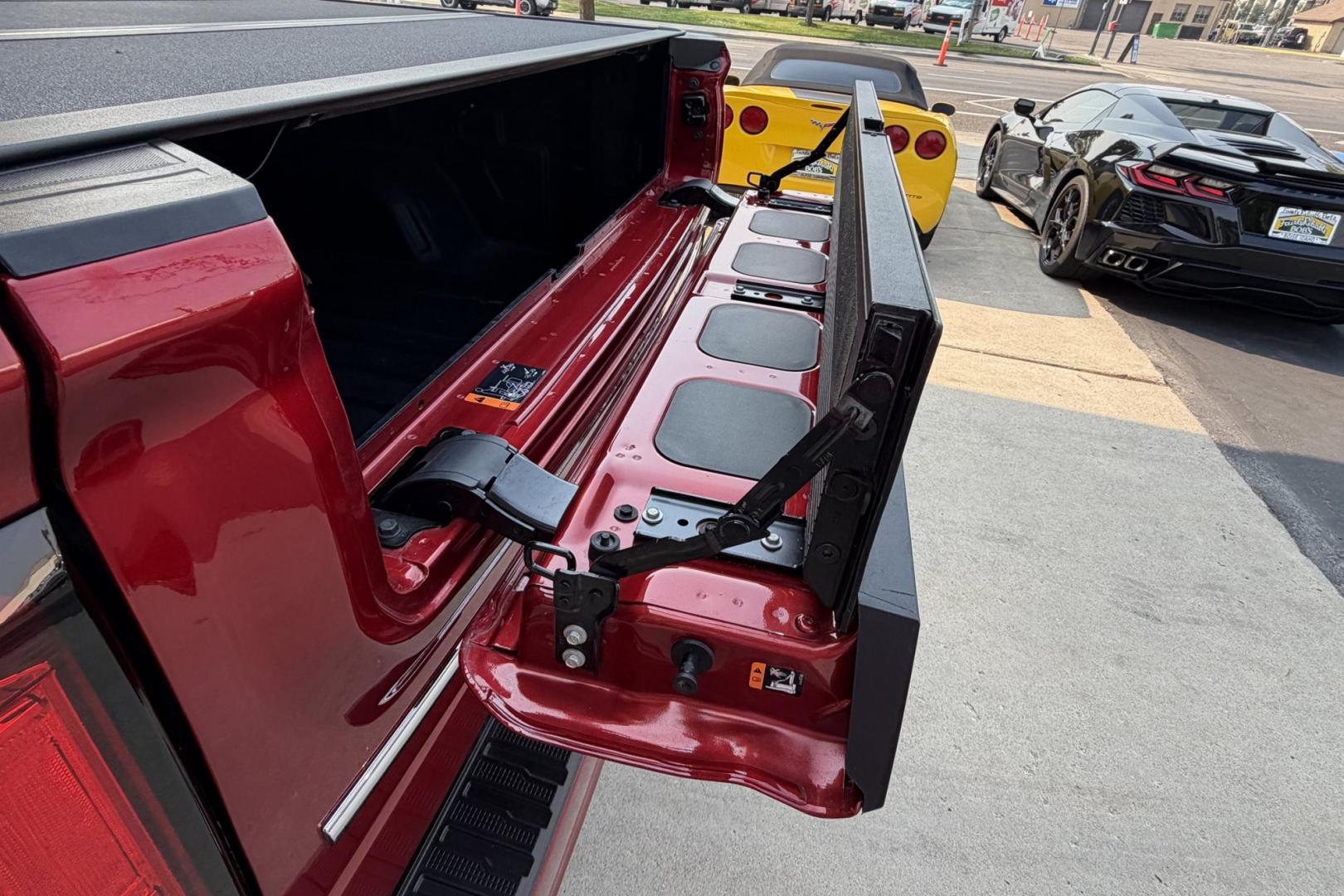 2023 Volcanic Red Tintcoat /Atmosphere/Brownstone GMC Sierra 1500 Denali (3GTUUGE81PG) with an 6 Cyl 3.0 Liter Duramax Turbo Diesel engine, Automatic 10 Speed transmission, located at 2304 W. Main St., Boise, ID, 83702, (208) 342-7777, 43.622105, -116.218658 - Clean, Low Mileage And Stunning! Power Running Boards Too!- Photo#35