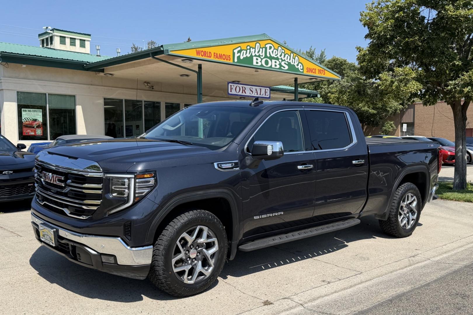 2024 Titanium Rush Metallic /Jet Black GMC Sierra 1500 SLT X31 (1GTUUDE88RZ) with an 6 Cyl 3.0 Liter Duramax Turbo Diesel engine, Automatic 10 Speed transmission, located at 2304 W. Main St., Boise, ID, 83702, (208) 342-7777, 43.622105, -116.218658 - New Tires! Highly Optioned And Ready To Go!- Photo#0