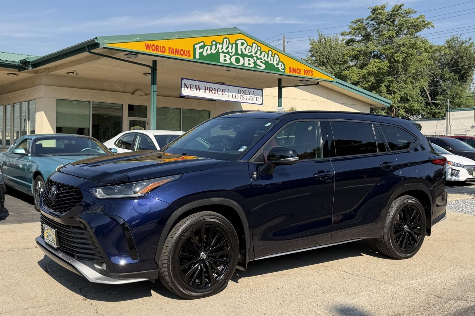 2023 Dark Blue Pearl /Red/Black Toyota Highlander XSE (5TDKDRBH9PS) with an 4 Cyl 2.4 Liter Turbo engine, Automatic 8 Speed transmission, located at 2304 W. Main St., Boise, ID, 83702, (208) 342-7777, 43.622105, -116.218658 - Highly Optioned, 7 Passenger And Clean!- Photo#0