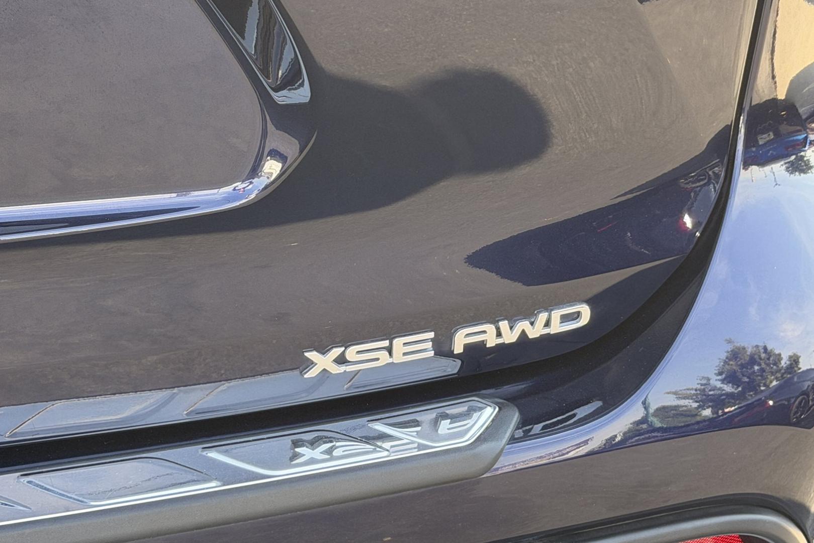 2023 Dark Blue Pearl /Red/Black Toyota Highlander XSE (5TDKDRBH9PS) with an 4 Cyl 2.4 Liter Turbo engine, Automatic 8 Speed transmission, located at 2304 W. Main St., Boise, ID, 83702, (208) 342-7777, 43.622105, -116.218658 - Highly Optioned, 7 Passenger And Clean!- Photo#24