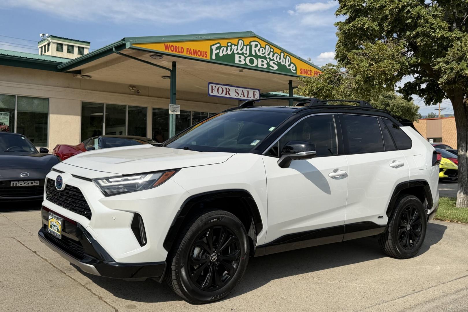 2024 Wind Chill Pearl /Black Toyota RAV4 Hybrid XSE (JTME6RFV8RD) with an 4 Cyl 2.5 Liter Hybrid engine, Automatic transmission, located at 2304 W. Main St., Boise, ID, 83702, (208) 342-7777, 43.622105, -116.218658 - New Tires! Great Fuel Economy! Hard To Find! Great To Own!- Photo#0