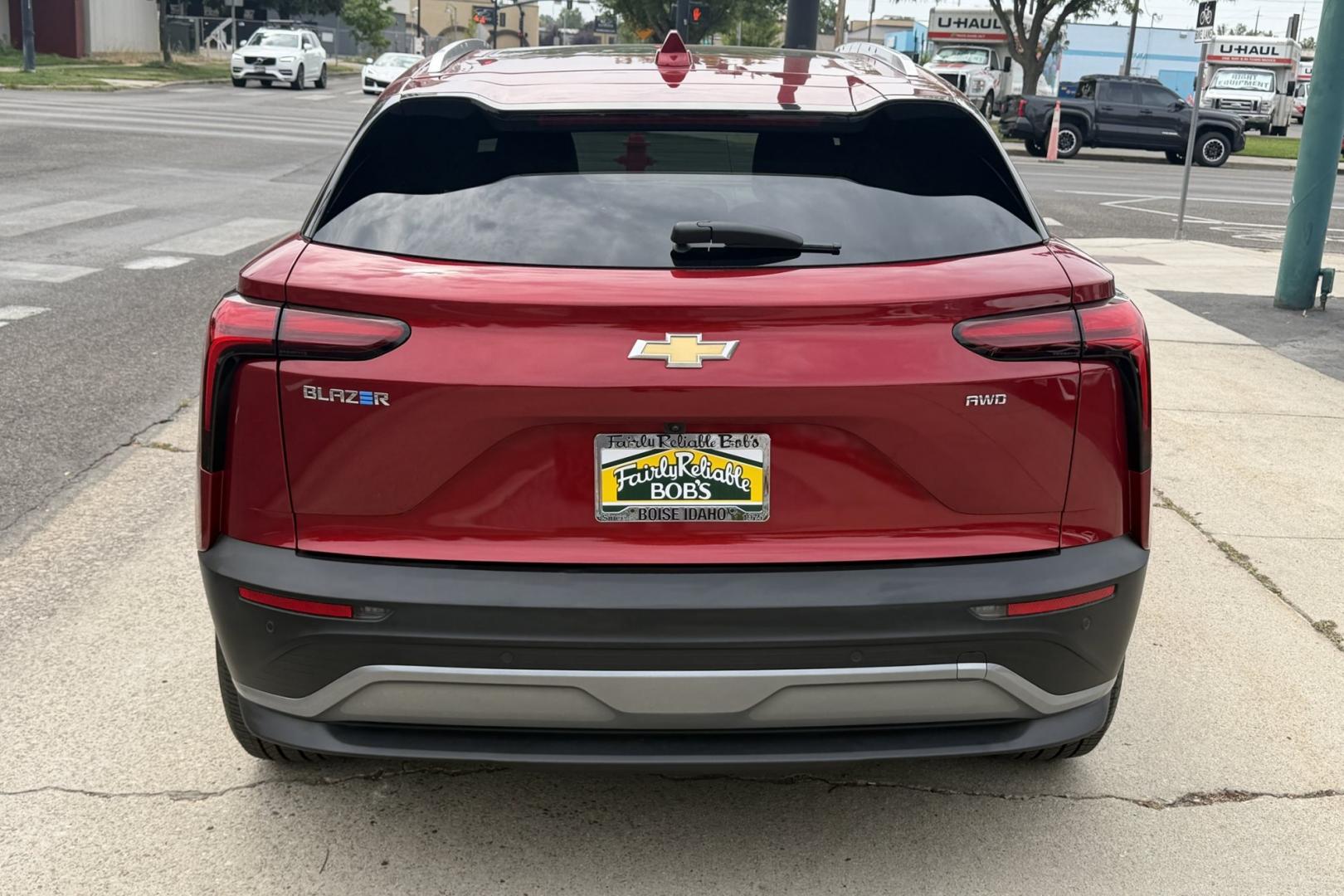 2024 Radiant Red /Black Chevrolet Blazer EV 2LT (3GNKDBRJ6RS) with an 85 kWh engine, Automatic transmission, located at 2304 W. Main St., Boise, ID, 83702, (208) 342-7777, 43.622105, -116.218658 - Remaining Factory Warranty! 279 Mile Range! Smooth Ride! Loaded With Safety Features Too!- Photo#1