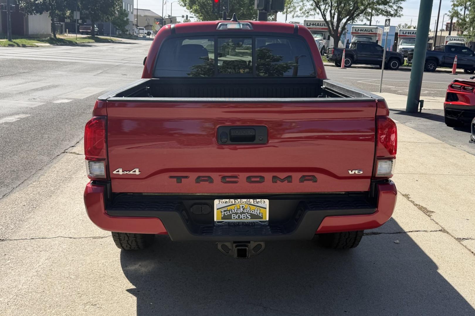 2021 Barcelona Red Metallic /Gray Toyota Tacoma SR (3TMCZ5AN6MM) with an V6 3.5 Liter engine, Automatic 6 Speed transmission, located at 2304 W. Main St., Boise, ID, 83702, (208) 342-7777, 43.622105, -116.218658 - V6 Tacoma! Low Mileage! Ready To Go!- Photo#1