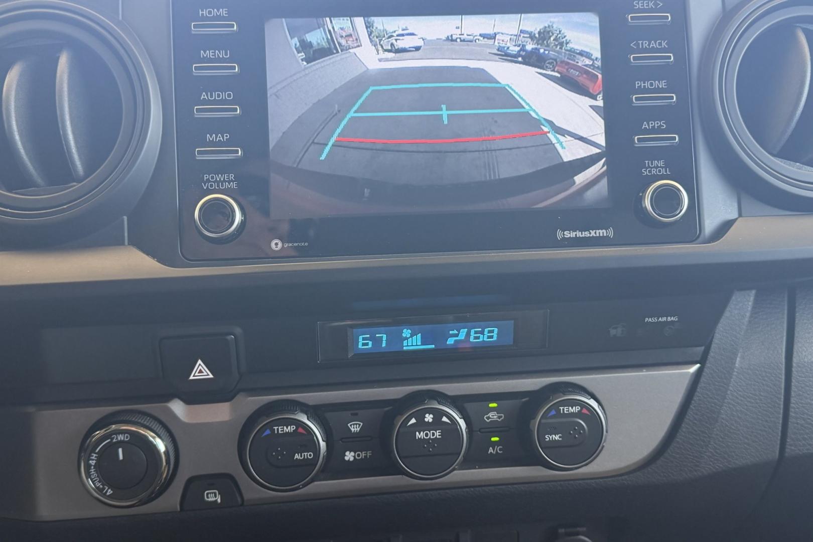 2021 Barcelona Red Metallic /Gray Toyota Tacoma SR (3TMCZ5AN6MM) with an V6 3.5 Liter engine, Automatic 6 Speed transmission, located at 2304 W. Main St., Boise, ID, 83702, (208) 342-7777, 43.622105, -116.218658 - V6 Tacoma! Low Mileage! Ready To Go!- Photo#4