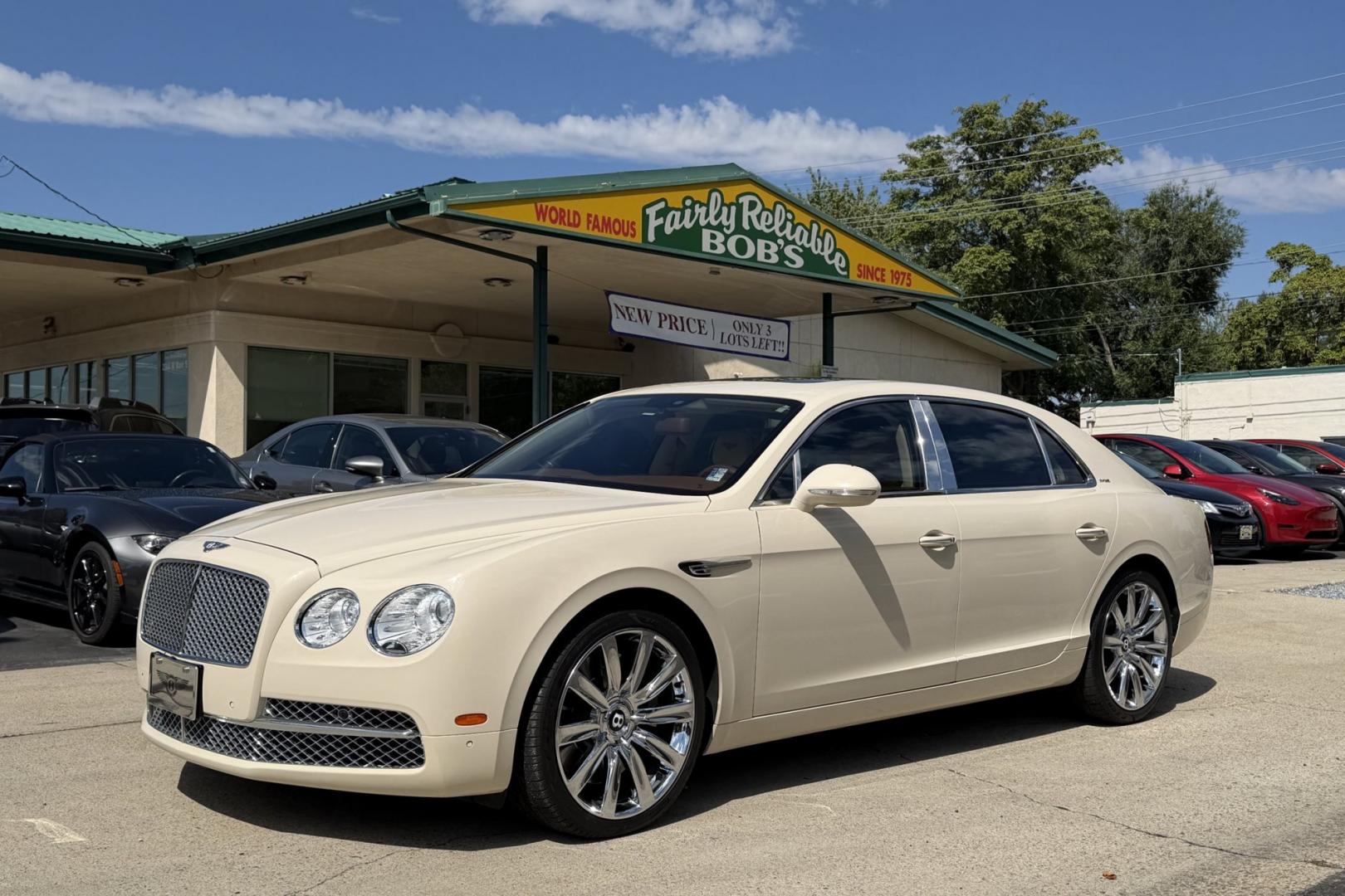 2014 White Sand /Magnolia Bentley Continental Flying Spur (SCBEC9ZA1EC) with an 6.0L W12 DOHC 48V TURBO FFV engine, Automatic 8 Speed transmission, located at 2304 W. Main St., Boise, ID, 83702, (208) 342-7777, 43.622105, -116.218658 - 616-Horsepower Twin Turbo W12 Engine! Ultra Luxury Sedan!- Photo#0