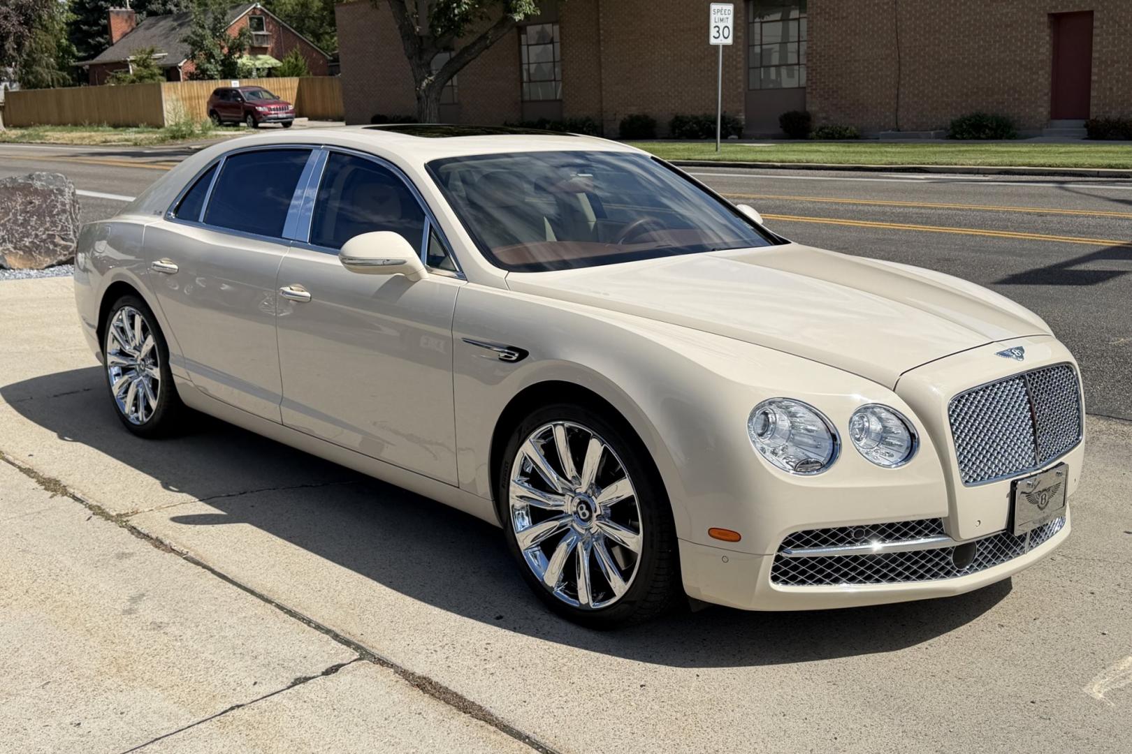 2014 White Sand /Magnolia Bentley Continental Flying Spur (SCBEC9ZA1EC) with an 6.0L W12 DOHC 48V TURBO FFV engine, Automatic 8 Speed transmission, located at 2304 W. Main St., Boise, ID, 83702, (208) 342-7777, 43.622105, -116.218658 - 616-Horsepower Twin Turbo W12 Engine! Ultra Luxury Sedan!- Photo#2