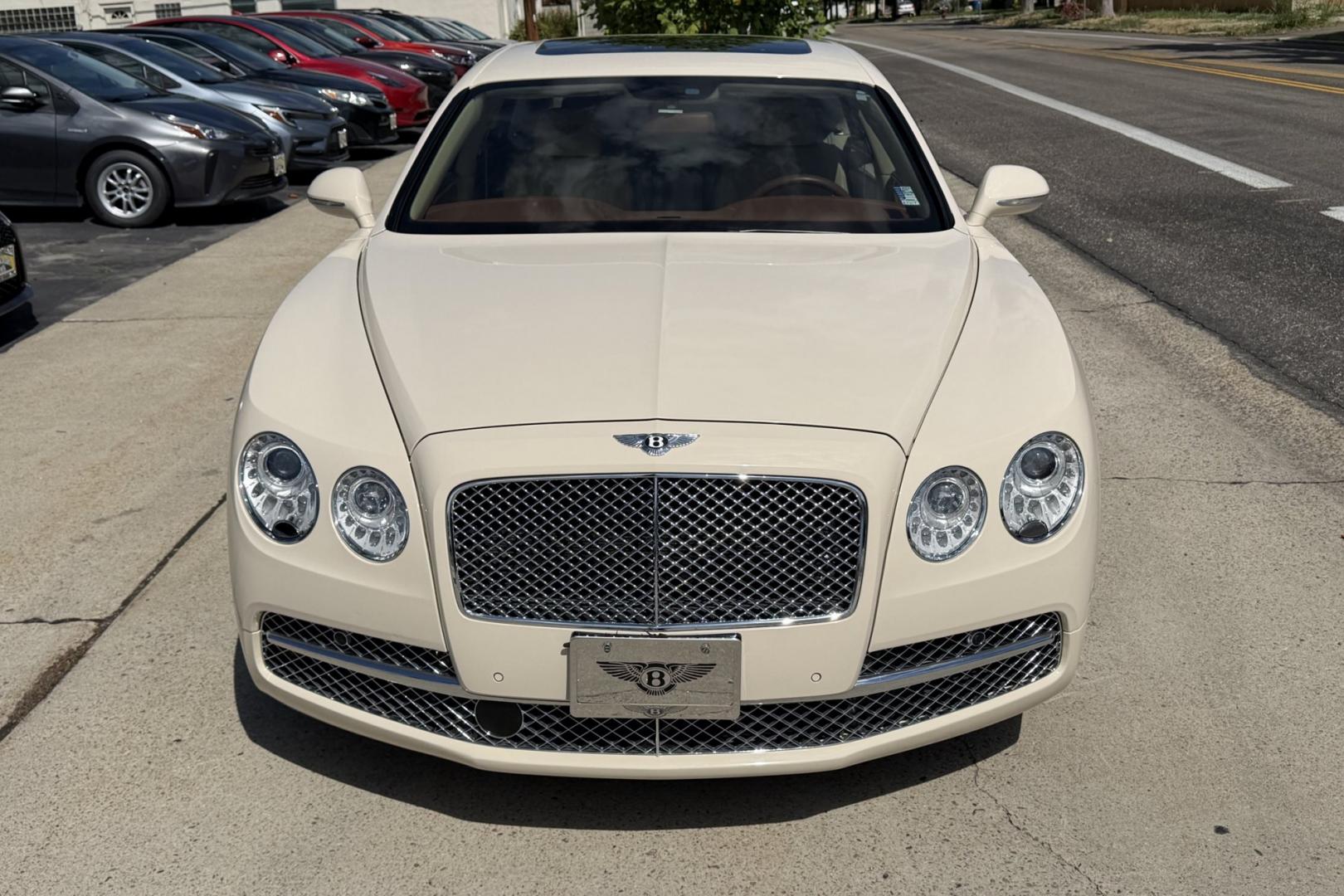 2014 White Sand /Magnolia Bentley Continental Flying Spur (SCBEC9ZA1EC) with an 6.0L W12 DOHC 48V TURBO FFV engine, Automatic 8 Speed transmission, located at 2304 W. Main St., Boise, ID, 83702, (208) 342-7777, 43.622105, -116.218658 - 616-Horsepower Twin Turbo W12 Engine! Ultra Luxury Sedan!- Photo#3