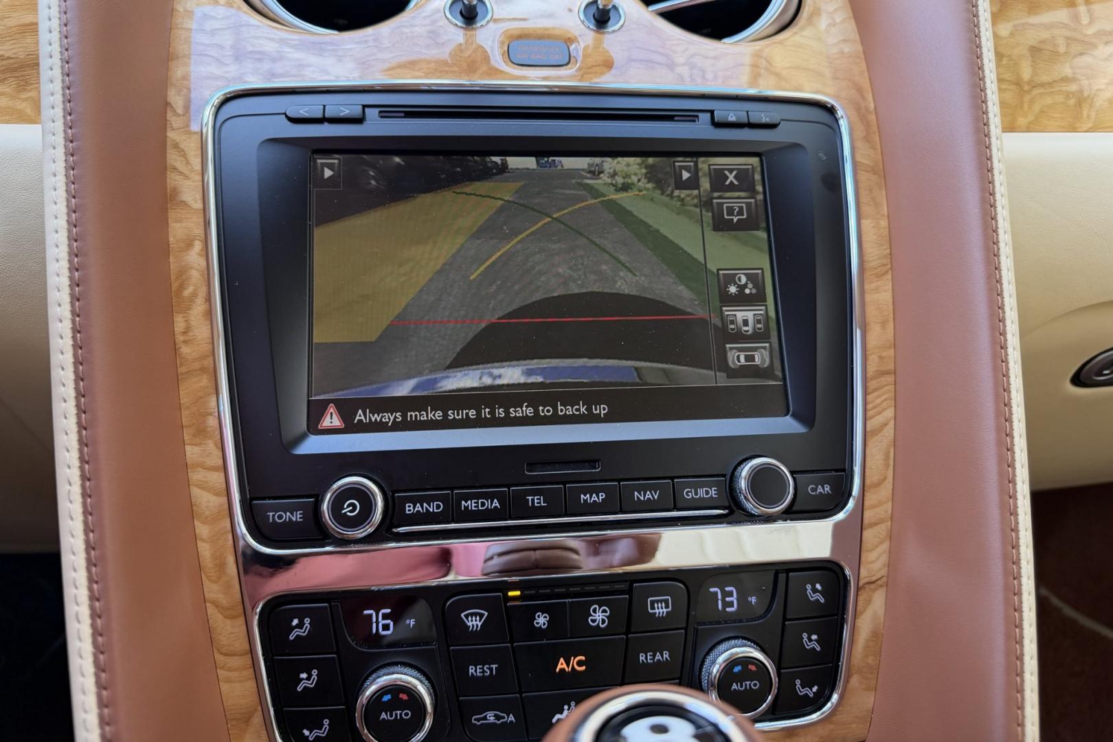 2014 White Sand /Magnolia Bentley Continental Flying Spur (SCBEC9ZA1EC) with an 6.0L W12 DOHC 48V TURBO FFV engine, Automatic 8 Speed transmission, located at 2304 W. Main St., Boise, ID, 83702, (208) 342-7777, 43.622105, -116.218658 - 616-Horsepower Twin Turbo W12 Engine! Ultra Luxury Sedan!- Photo#5