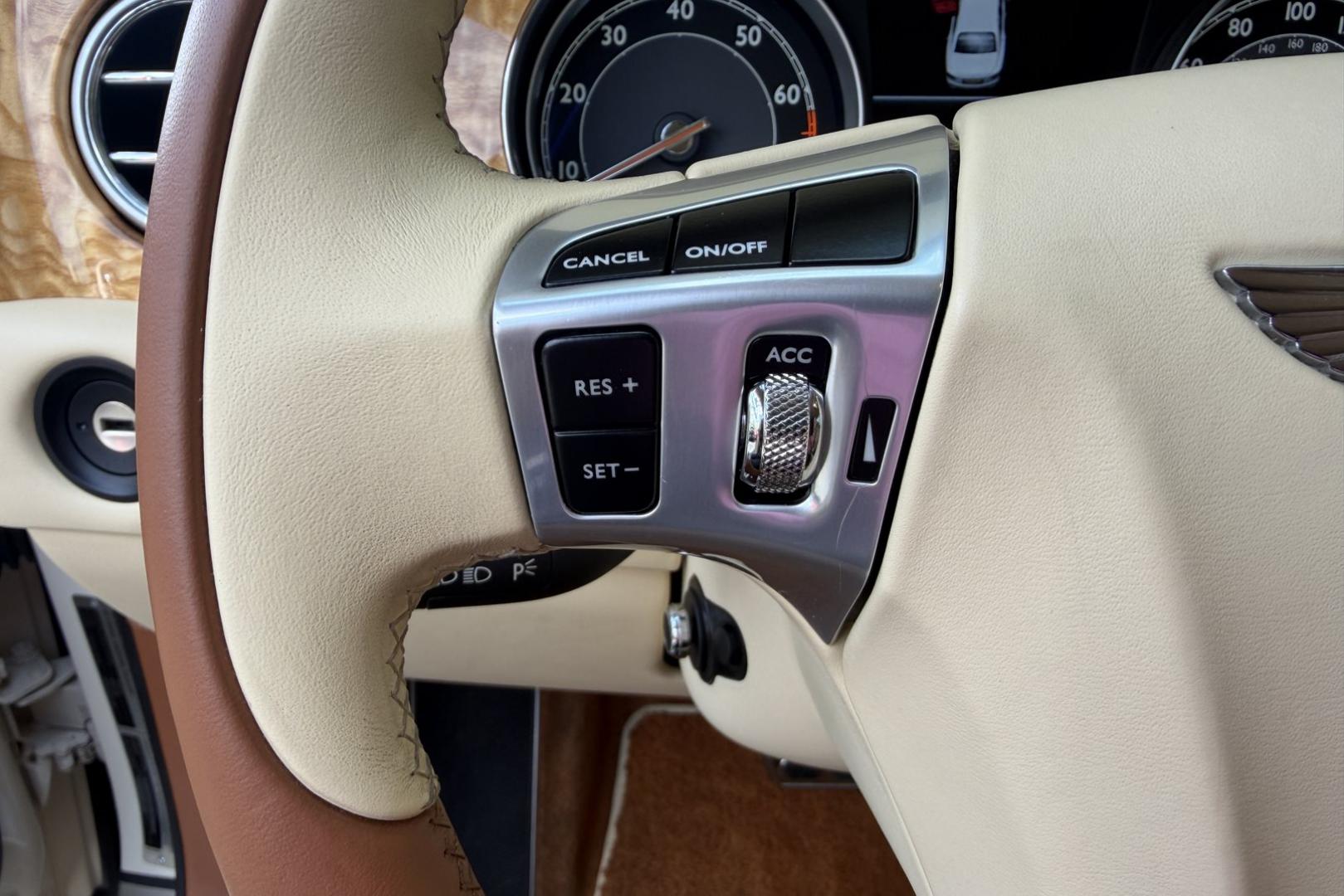 2014 White Sand /Magnolia Bentley Continental Flying Spur (SCBEC9ZA1EC) with an 6.0L W12 DOHC 48V TURBO FFV engine, Automatic 8 Speed transmission, located at 2304 W. Main St., Boise, ID, 83702, (208) 342-7777, 43.622105, -116.218658 - 616-Horsepower Twin Turbo W12 Engine! Ultra Luxury Sedan!- Photo#7