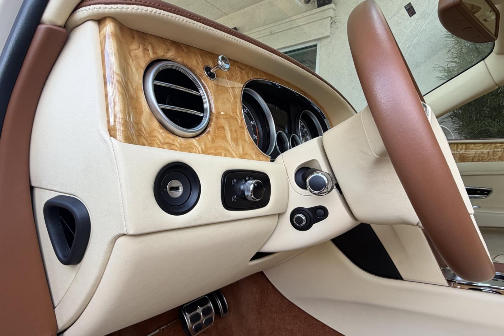 2014 White Sand /Magnolia Bentley Continental Flying Spur (SCBEC9ZA1EC) with an 6.0L W12 DOHC 48V TURBO FFV engine, Automatic 8 Speed transmission, located at 2304 W. Main St., Boise, ID, 83702, (208) 342-7777, 43.622105, -116.218658 - 616-Horsepower Twin Turbo W12 Engine! Ultra Luxury Sedan!- Photo#11