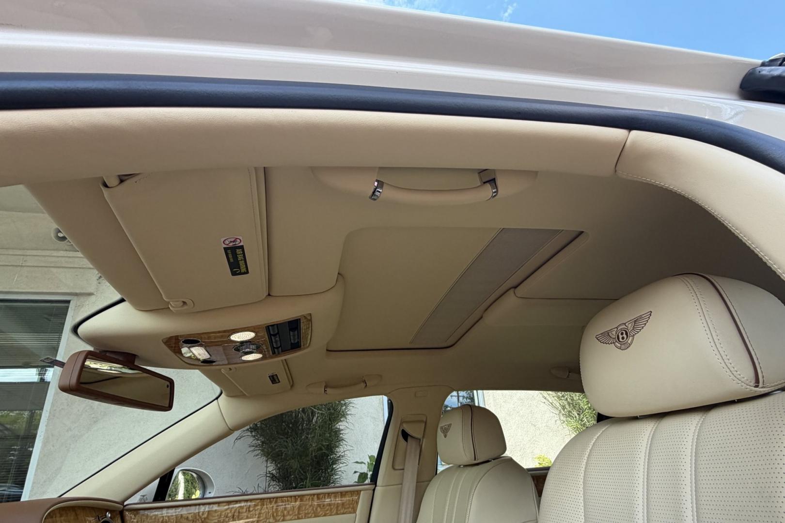 2014 White Sand /Magnolia Bentley Continental Flying Spur (SCBEC9ZA1EC) with an 6.0L W12 DOHC 48V TURBO FFV engine, Automatic 8 Speed transmission, located at 2304 W. Main St., Boise, ID, 83702, (208) 342-7777, 43.622105, -116.218658 - 616-Horsepower Twin Turbo W12 Engine! Ultra Luxury Sedan!- Photo#12