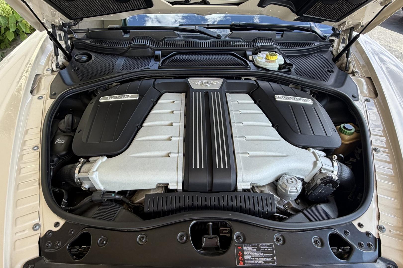 2014 White Sand /Magnolia Bentley Continental Flying Spur (SCBEC9ZA1EC) with an 6.0L W12 DOHC 48V TURBO FFV engine, Automatic 8 Speed transmission, located at 2304 W. Main St., Boise, ID, 83702, (208) 342-7777, 43.622105, -116.218658 - 616-Horsepower Twin Turbo W12 Engine! Ultra Luxury Sedan!- Photo#18