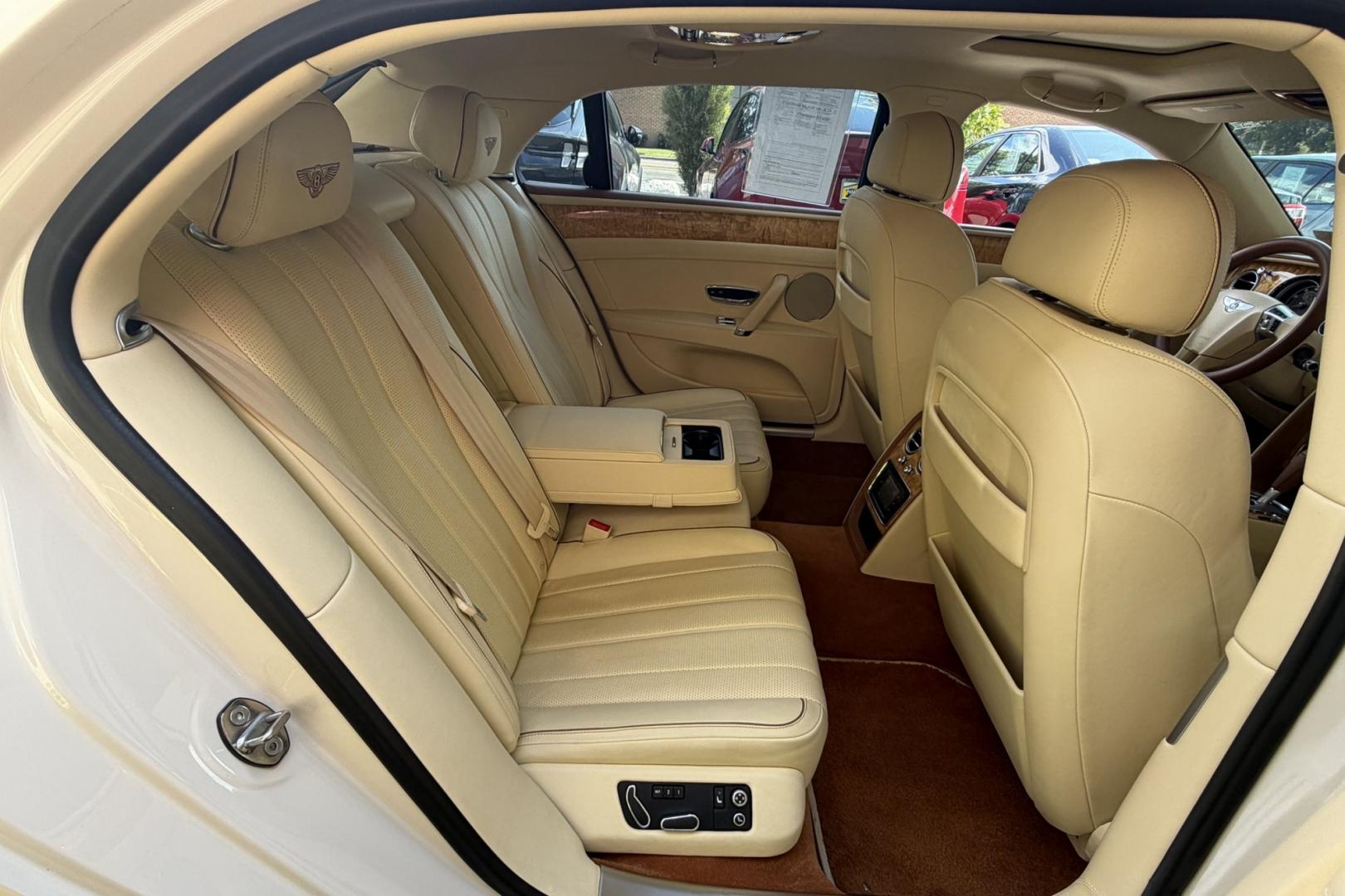 2014 White Sand /Magnolia Bentley Continental Flying Spur (SCBEC9ZA1EC) with an 6.0L W12 DOHC 48V TURBO FFV engine, Automatic 8 Speed transmission, located at 2304 W. Main St., Boise, ID, 83702, (208) 342-7777, 43.622105, -116.218658 - 616-Horsepower Twin Turbo W12 Engine! Ultra Luxury Sedan!- Photo#22
