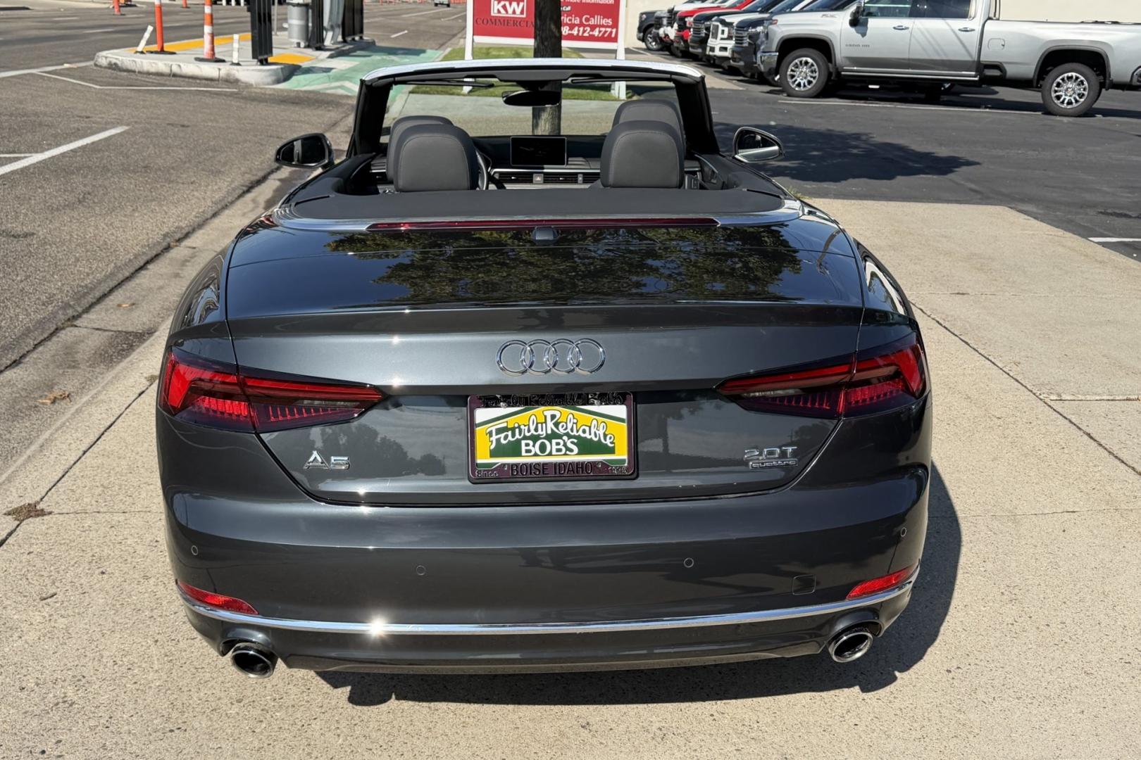 2018 Manhattan Gray Metallic /Black Audi A5 Premium Plus Cabriolet Quattro 7A (WAUYNGF57JN) with an 2.0L L4 DOHC 16V TURBO engine, Automatic 7 Speed transmission, located at 2304 W. Main St., Boise, ID, 83702, (208) 342-7777, 43.622105, -116.218658 - Stunning All Wheel Drive Audi Convertible!- Photo#1