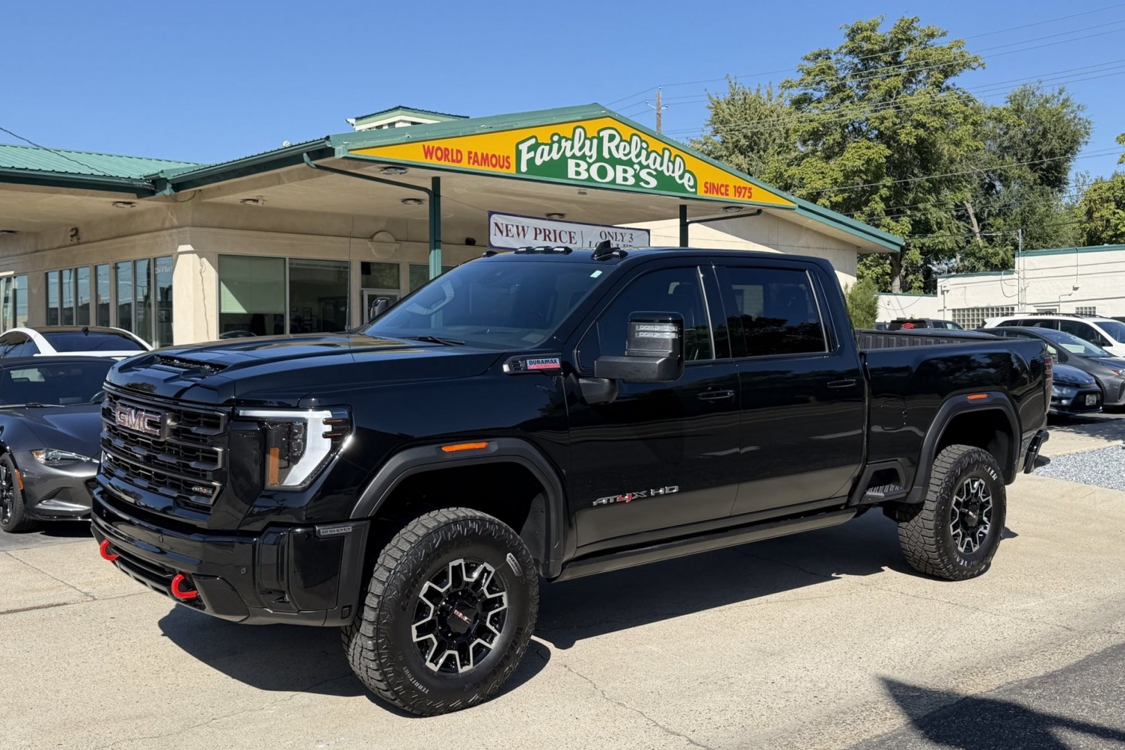 2026 Onxy Black /Obsidian Rush GMC Sierra 2500HD AT4X (1GT4UZEY5TF) with an V8 6.6 Liter Duramax Turbo Diesel engine, Allison Automatic 10 Speed transmission, located at 2304 W. Main St., Boise, ID, 83702, (208) 342-7777, 43.622105, -116.218658 - Low Mileage! Loaded And Stunning!- Photo#0