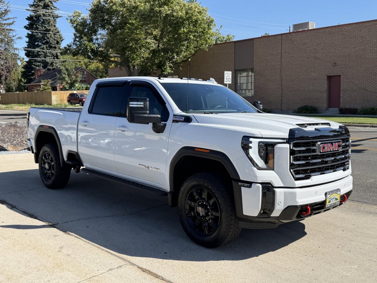 2025 Summit White /Black GMC Sierra 3500HD AT4 (1GT4UVEY2SF) with an V8 6.6 Liter Duramax Turbo Diesel engine, Allison Automatic 10 Speed transmission, located at 2304 W. Main St., Boise, ID, 83702, (208) 342-7777, 43.622105, -116.218658 - Ready To Haul! Nicely Optioned!- Photo#4