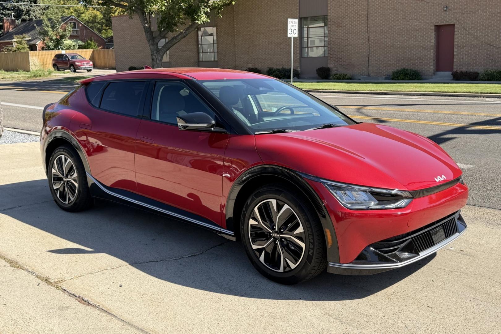 2023 Runaway Red /Black Kia EV6 Wind (KNDC3DLC1P5) with an 77.4 kWh engine, Automatic transmission, located at 2304 W. Main St., Boise, ID, 83702, (208) 342-7777, 43.622105, -116.218658 - 282 Miles of Range! All Wheel Drive! High Marks In Safety Too!- Photo#2