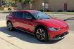 2023 Runaway Red /Black Kia EV6 Wind (KNDC3DLC1P5) with an 77.4 kWh engine, Automatic transmission, located at 2304 W. Main St., Boise, ID, 83702, (208) 342-7777, 43.622105, -116.218658 - 282 Miles of Range! All Wheel Drive! High Marks In Safety Too!- Photo#2