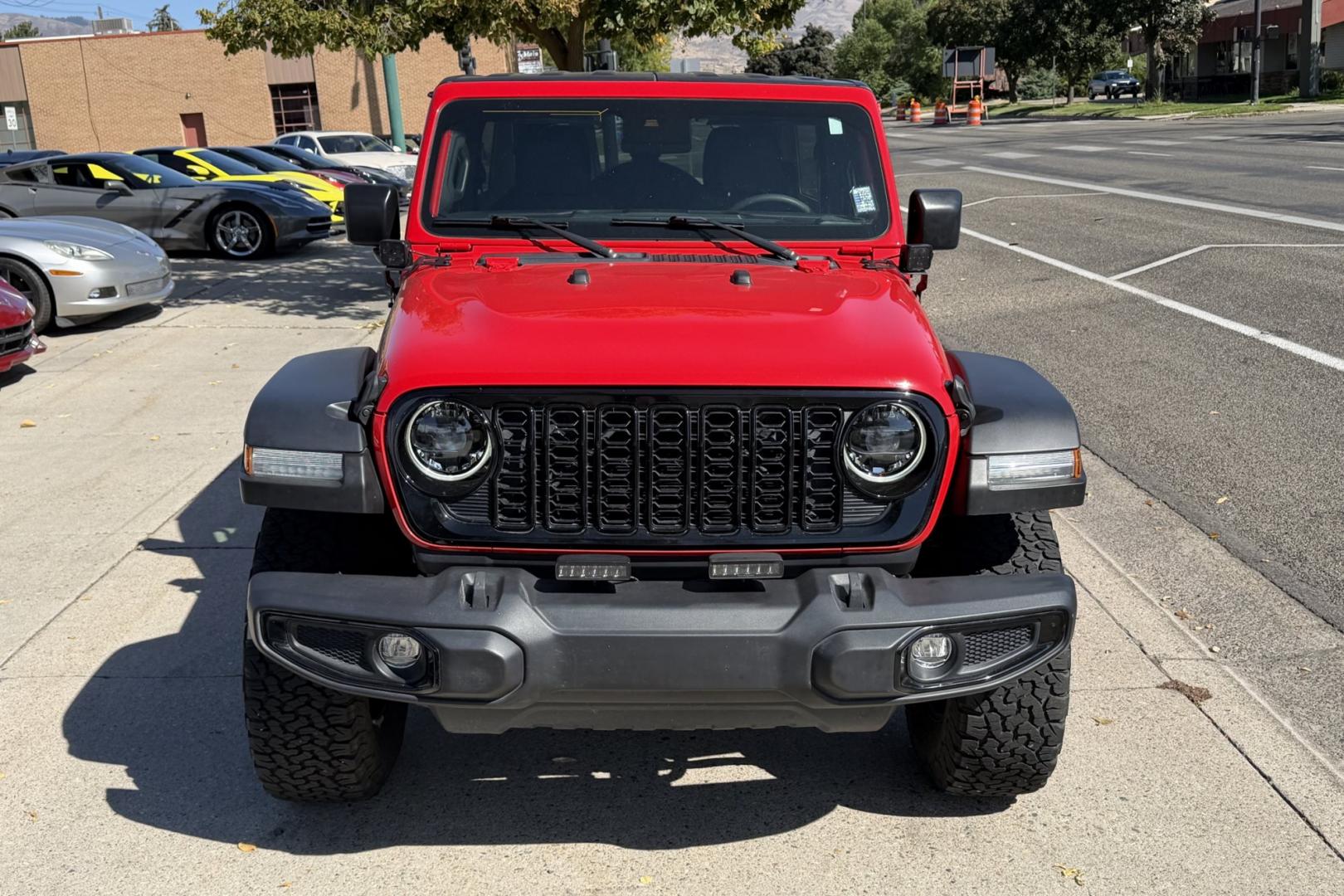 2024 Firecracker Red /Black Jeep Wrangler Unlimited Willys (1C4PJXDG7RW) with an V6 3.6 Liter engine, 6 Speed Manual transmission, located at 2304 W. Main St., Boise, ID, 83702, (208) 342-7777, 43.622105, -116.218658 - Manual Transmission Jeep Wrangler Unlimited Willys! Ready For Adventure!- Photo#3