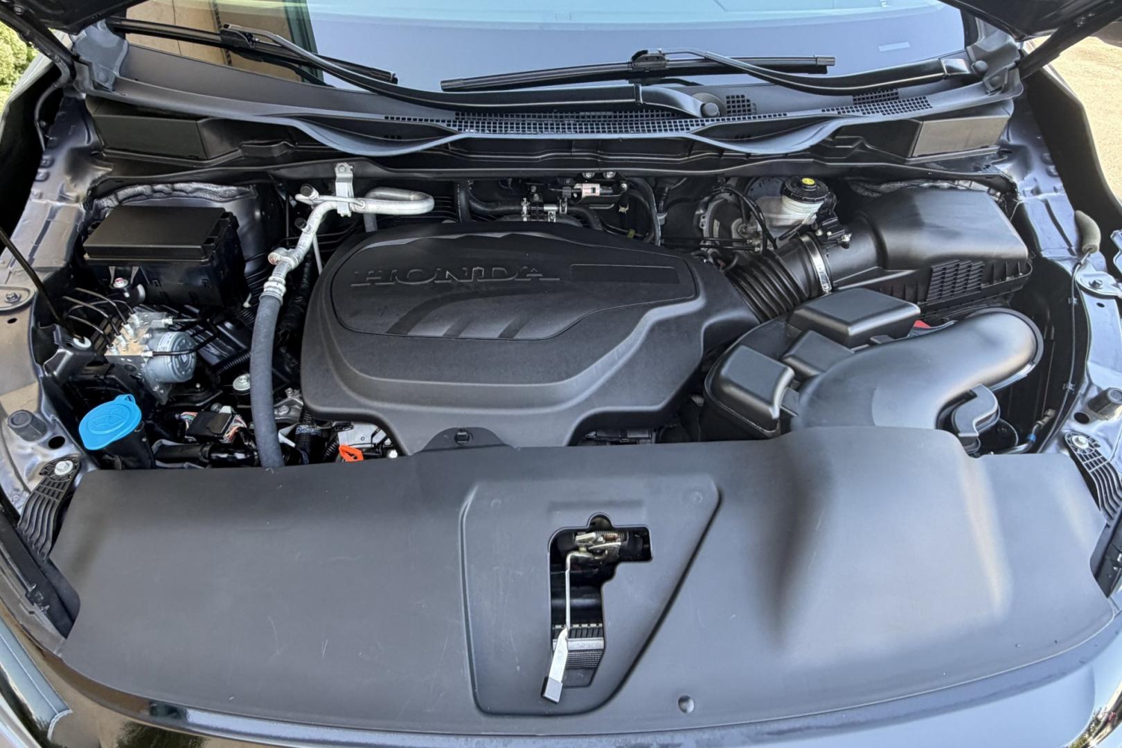 2025 Modern Steel Metallic /Gray Honda Odyssey Elite (5FNRL6H97SB) with an 3.5L V6 SOHC 24V engine, Automatic 10 Speed transmission, located at 2304 W. Main St., Boise, ID, 83702, (208) 342-7777, 43.622105, -116.218658 - Low Mileage! Highly Optioned Elite Trim! Factory Entertainment System!- Photo#19