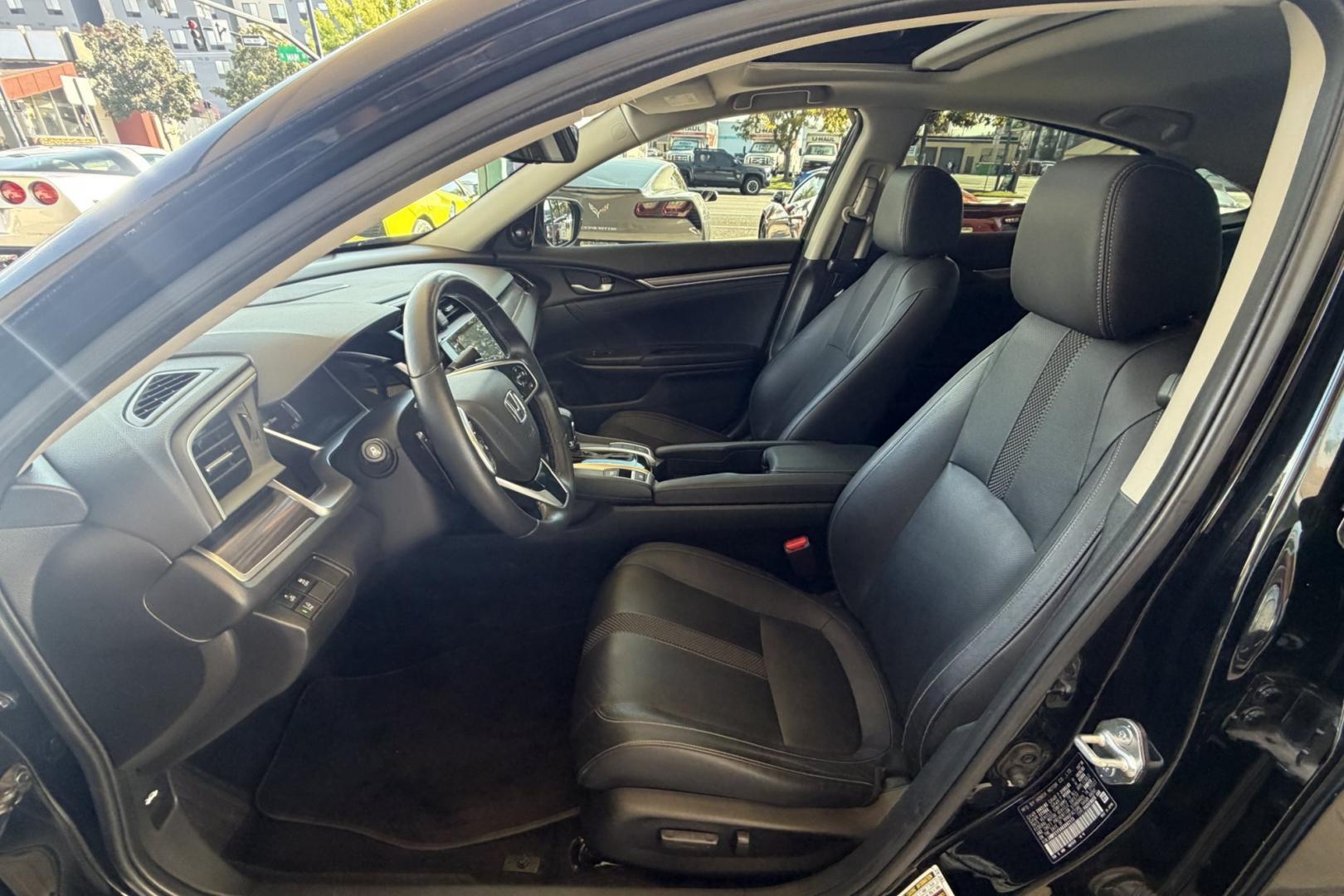 2019 Crystal Black Pearl /Black Honda Civic Touring (JHMFC1F99KX) with an 4 Cyl 1.5 Liter Turbo engine, Automatic transmission, located at 2304 W. Main St., Boise, ID, 83702, (208) 342-7777, 43.622105, -116.218658 - Highly Optioned! Clean Civic Touring!- Photo#12