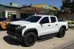 2024 Summit White /Black Chevrolet Colorado Trail Boss (1GCPTEEK2R1) with an 4 Cyl 2.7 Liter engine, Automatic 8 Speed transmission, located at 2304 W. Main St., Boise, ID, 83702, (208) 342-7777, 43.622105, -116.218658 - Remaining Factory Warranty! Wireless Apple Car Play/Android Auto! Nicely Optioned!- Photo#0