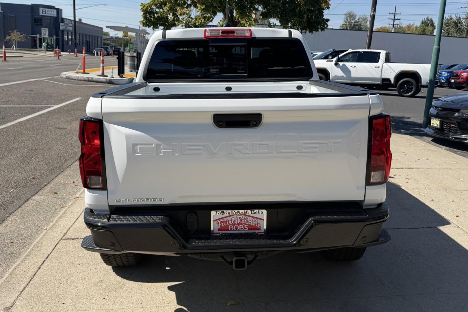 2024 Summit White /Black Chevrolet Colorado Trail Boss (1GCPTEEK2R1) with an 4 Cyl 2.7 Liter engine, Automatic 8 Speed transmission, located at 2304 W. Main St., Boise, ID, 83702, (208) 342-7777, 43.622105, -116.218658 - Remaining Factory Warranty! Wireless Apple Car Play/Android Auto! Nicely Optioned!- Photo#1