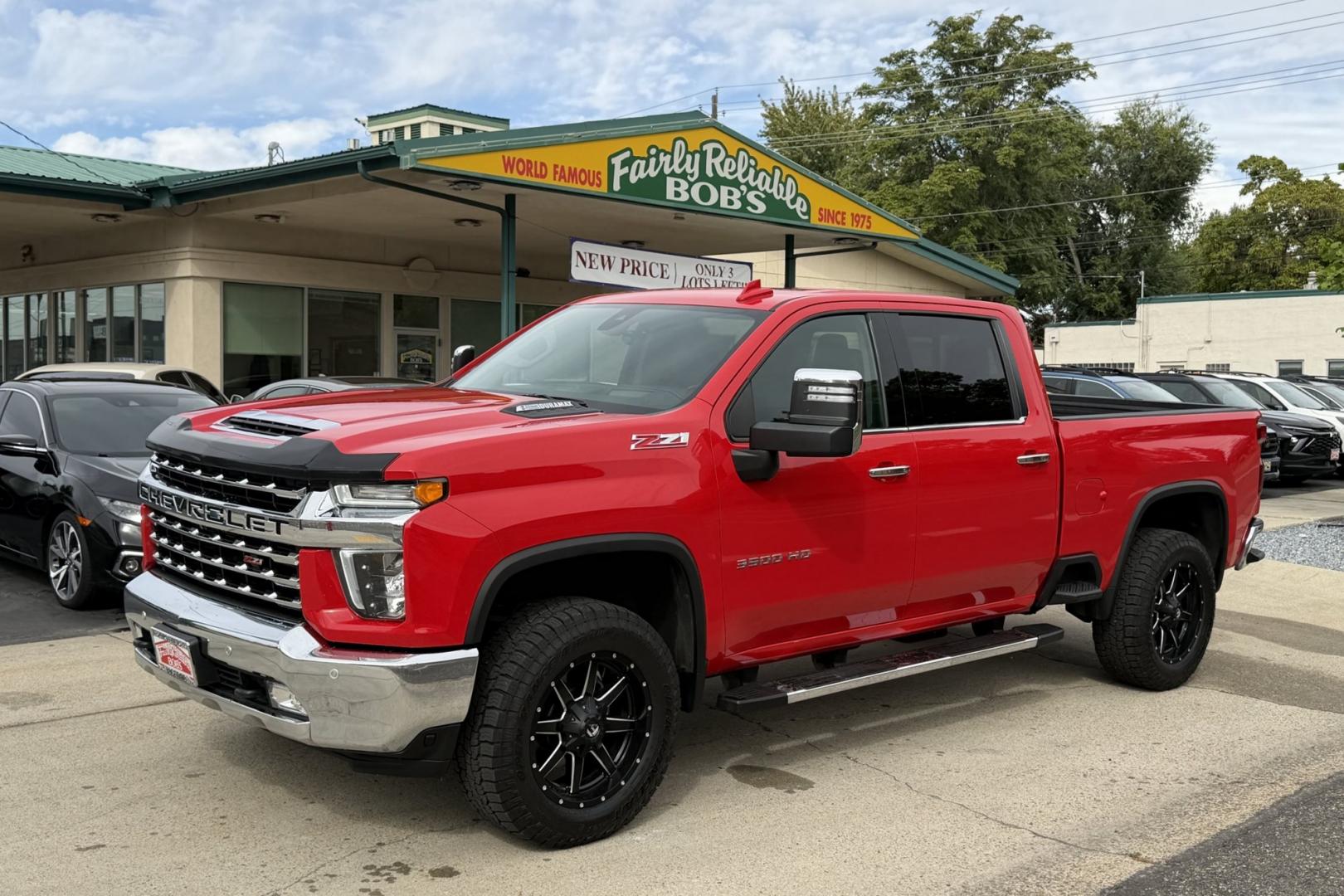 2023 Red Hot /Jet Black Chevrolet Silverado 3500HD LTZ (2GC4YUEY0P1) with an V8 6.6 Liter Turbo Diesel engine, Automatic Allison 10 Speed transmission, located at 2304 W. Main St., Boise, ID, 83702, (208) 342-7777, 43.622105, -116.218658 - Ready To Haul! Duramax Turbo Diesel!- Photo#0
