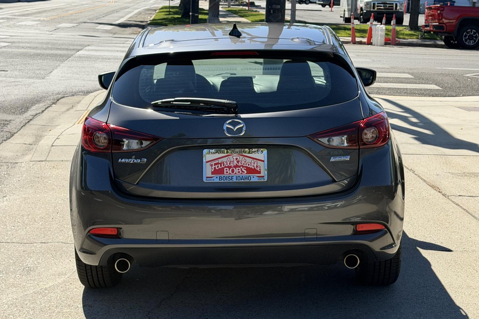 2018 Machine Gray Metallic /Black Mazda Mazda3 Touring (3MZBN1L3XJM) with an 4 Cyl 2.5 Liter engine, Automatic 6 Speed transmission, located at 2304 W. Main St., Boise, ID, 83702, (208) 342-7777, 43.622105, -116.218658 - Low Mileage! Sunroof! Heated Seats And Great Fuel Economy Too!- Photo#1
