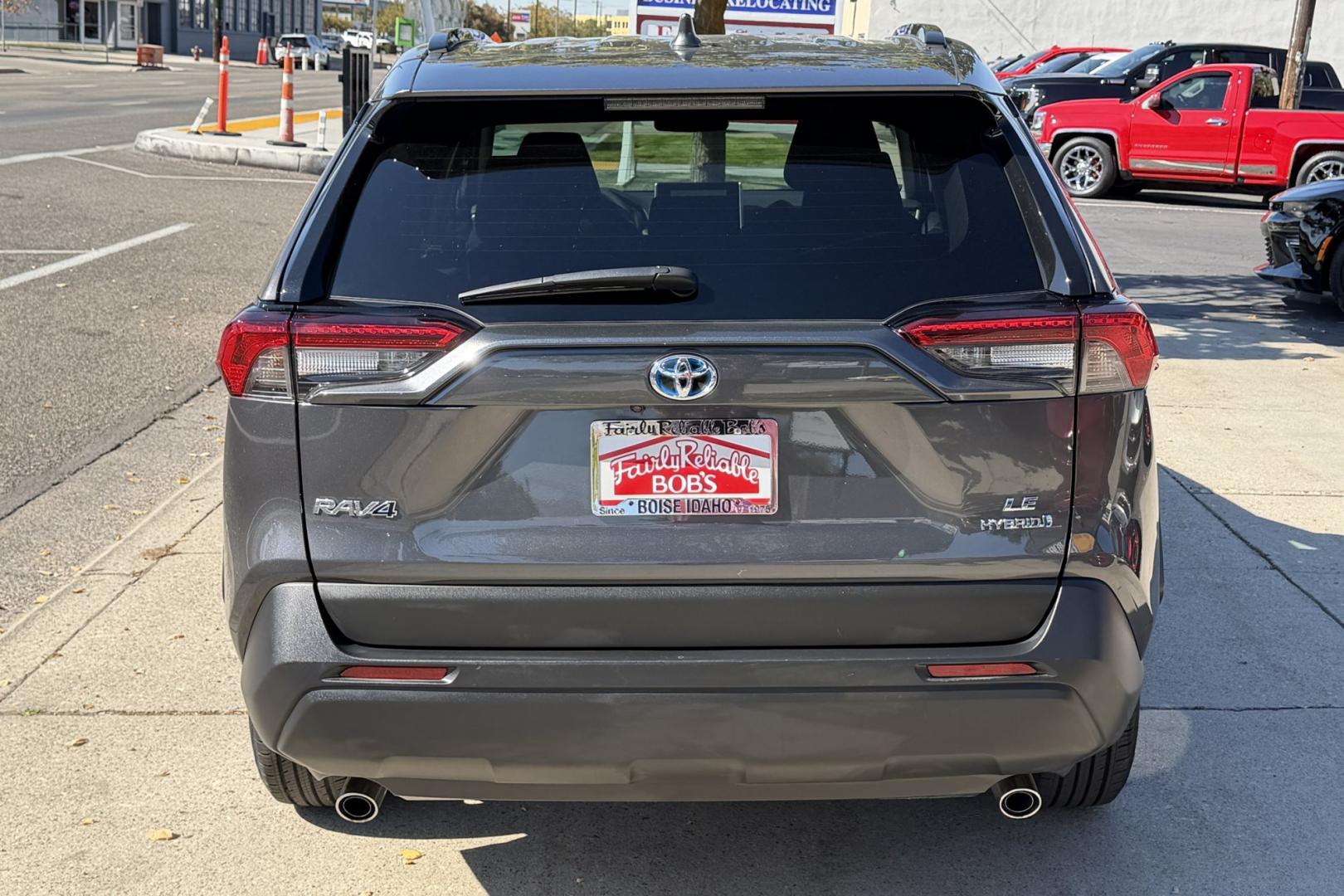 2024 Magnetic Gray /Black Toyota RAV4 Hybrid LE (2T3MWRFV2RW) with an 4 Cyl 2.5 Liter Hybrid engine, Automatic transmission, located at 2304 W. Main St., Boise, ID, 83702, (208) 342-7777, 43.622105, -116.218658 - New Tires! Hybrid! Save Now!- Photo#1