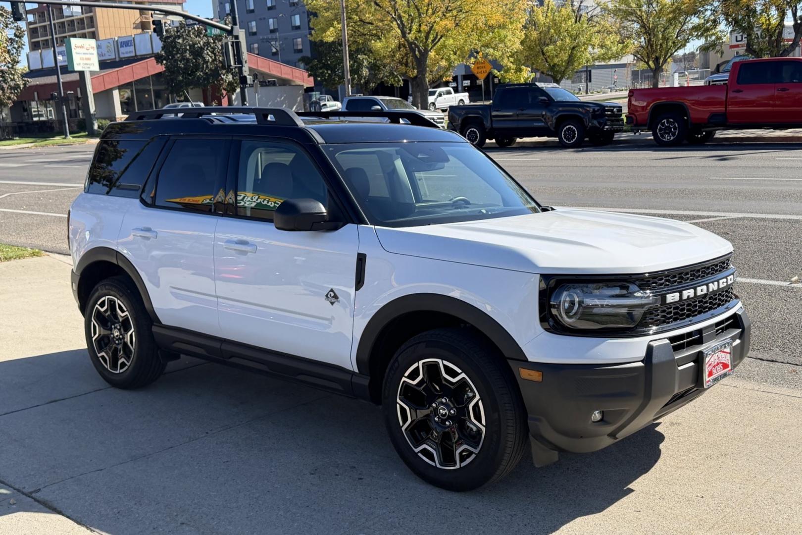 2025 Oxford White /Ebony Roast Premium Trim Ford Bronco Sport Outer Banks (3FMCR9CN7SR) with an 3 Cyl 1.5 Liter Turbo engine, Automatic 8 Speed transmission, located at 2304 W. Main St., Boise, ID, 83702, (208) 342-7777, 43.622105, -116.218658 - Remaining Factory Warranty! Clean!- Photo#2