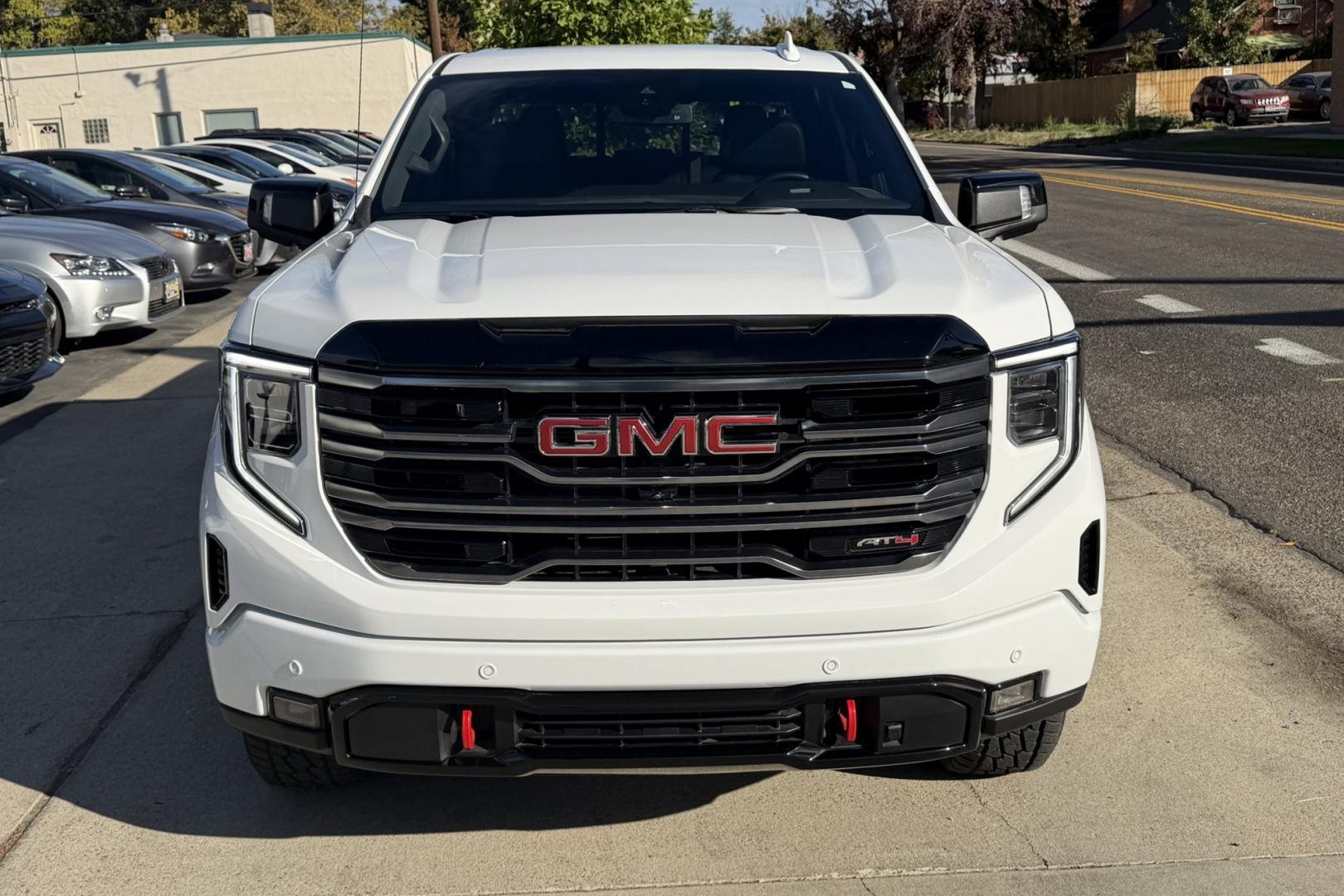 2025 Summit White /Black GMC Sierra 1500 AT4 (1GTUUEE85SZ) with an 6 Cyl 3.0 Liter Duramax Turbo Diesel engine, Automatic 10 Speed transmission, located at 2304 W. Main St., Boise, ID, 83702, (208) 342-7777, 43.622105, -116.218658 - New Tires! Remaining Factory Warranty! Nice Ride!- Photo#3